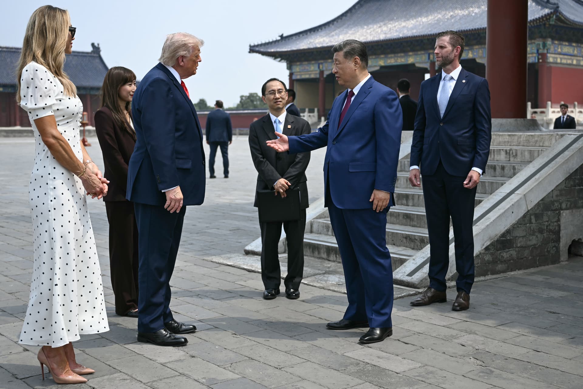 Eric Trump, far right, and his spouse Lara look on as Presidents Trump and Xi Jinping  speak during a visit to the Temple of Heaven at Beijing on May 14, 2026.