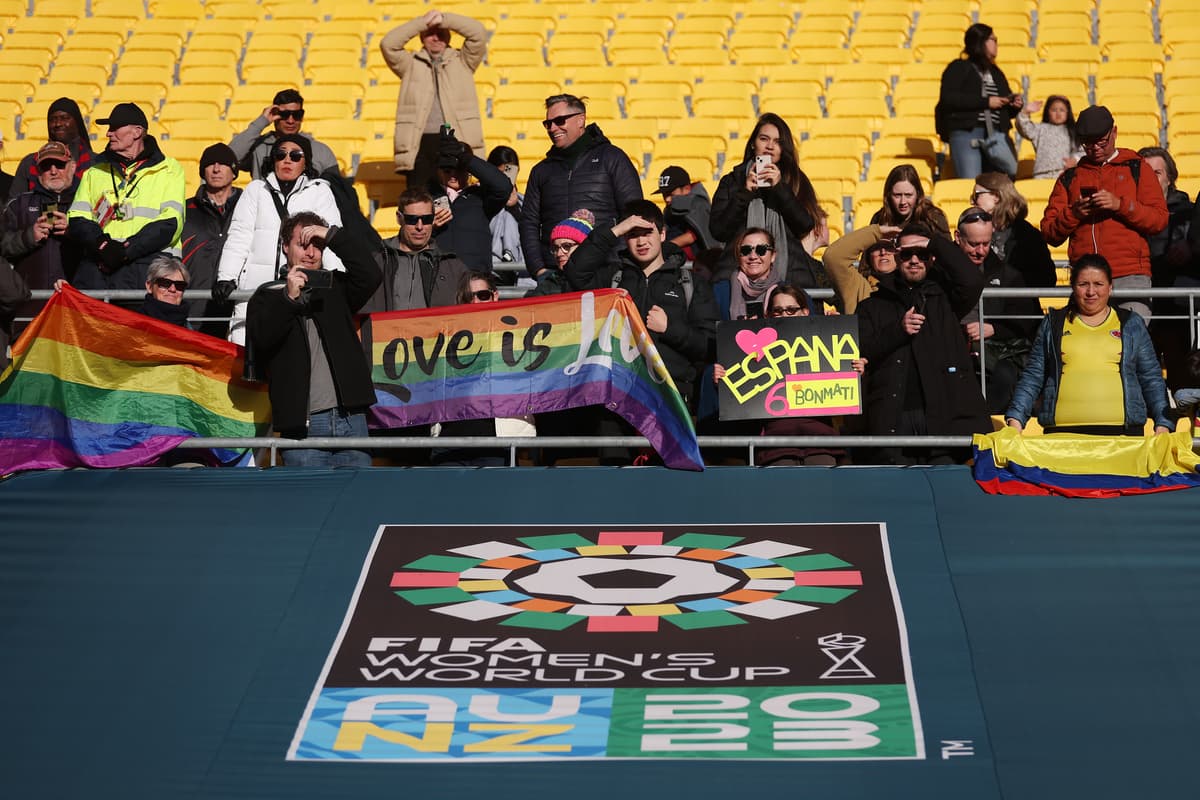 Soccer fans display pride flags at a FIFA Women's World Cup match between Spain and Netherlands at Wellington, New Zealand, on August 11, 2023. 