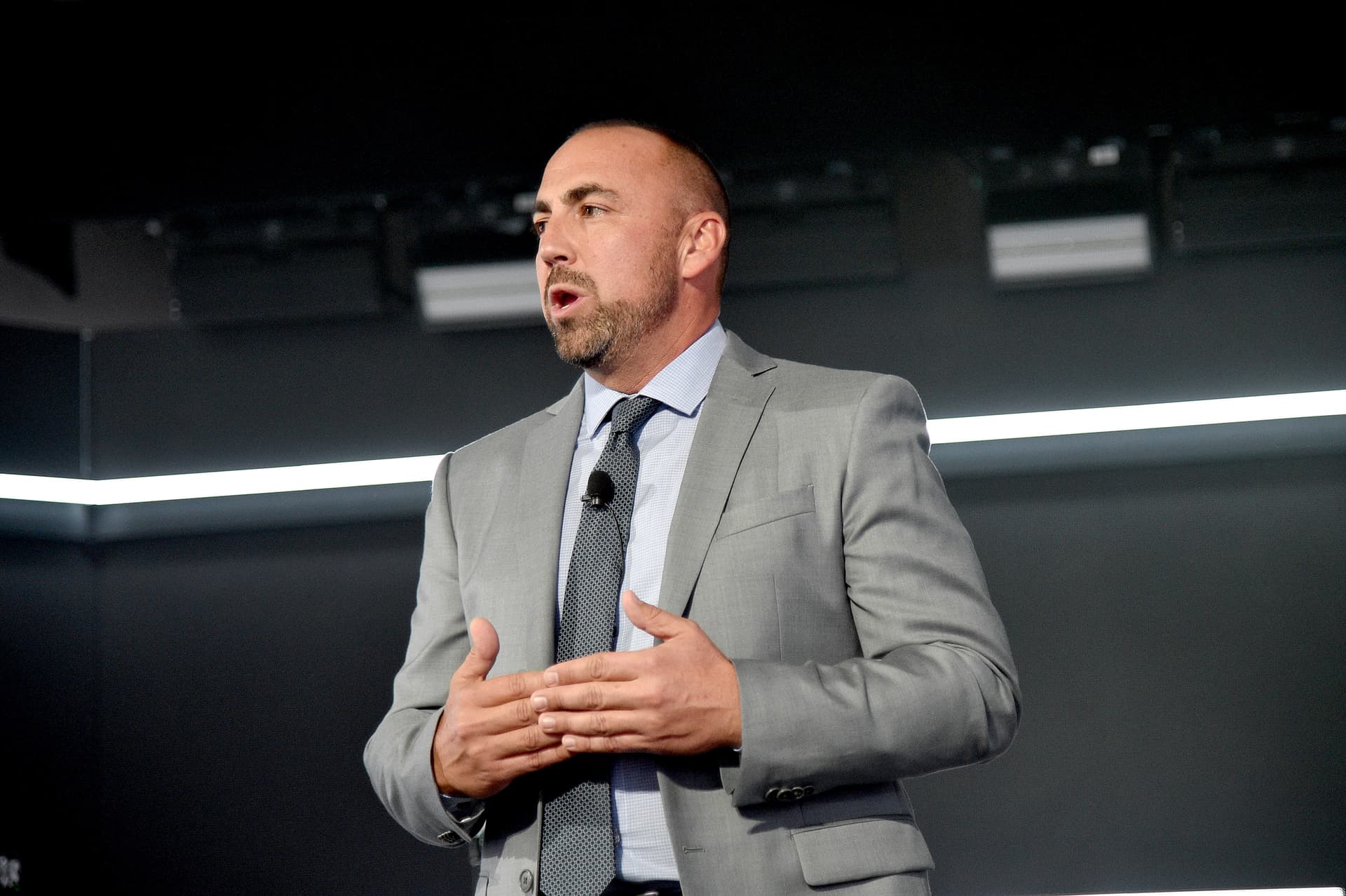  Kevin McGurn, the new CEO of the parent company behind Truth Social, speaks during an event at New York City on October 16, 2019.