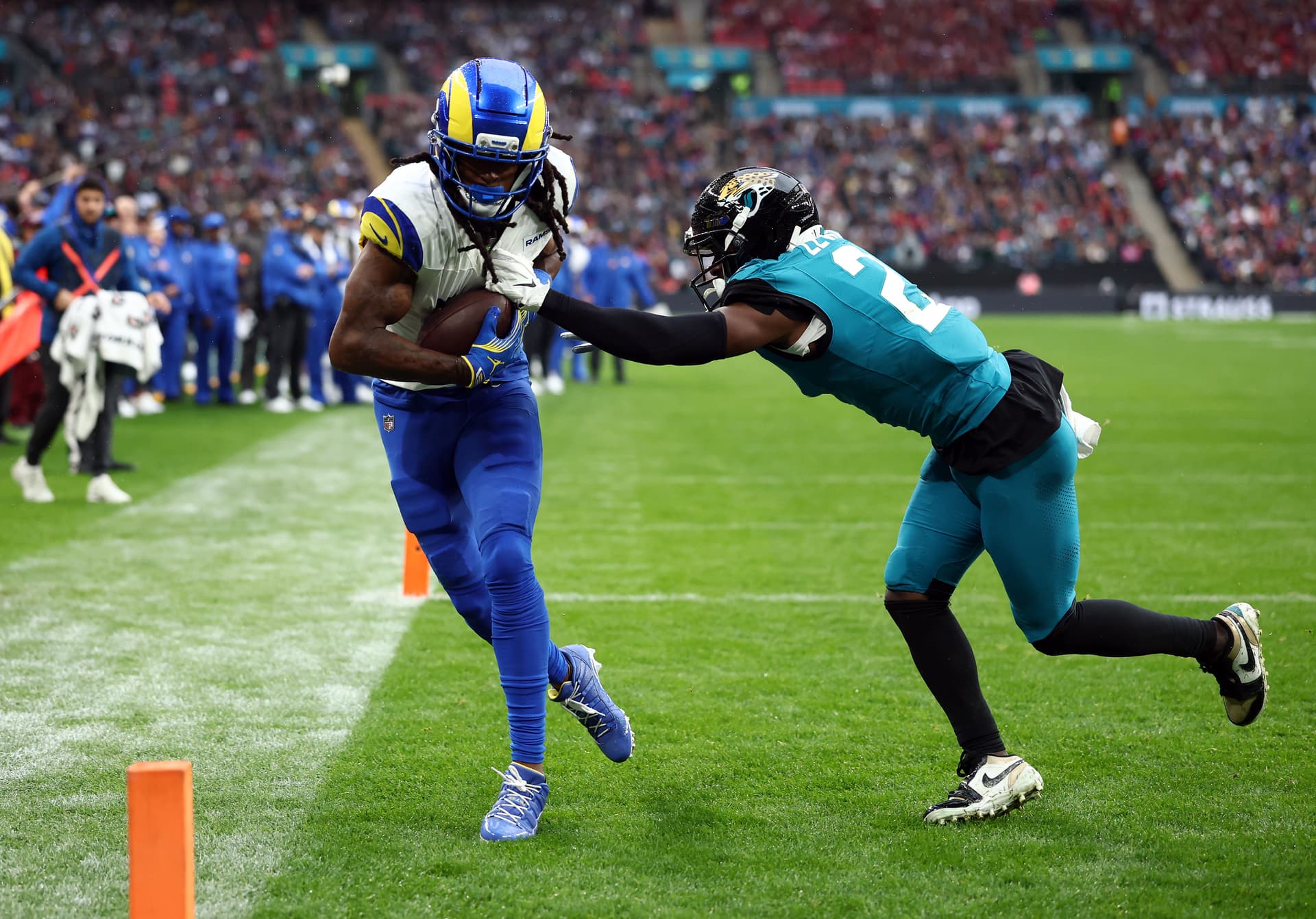 Davante Adams of the Los Angeles Rams catches a touchdown pass against the Jacksonville Jaguars at London’s  Wembley Stadium on October 19, 2025.