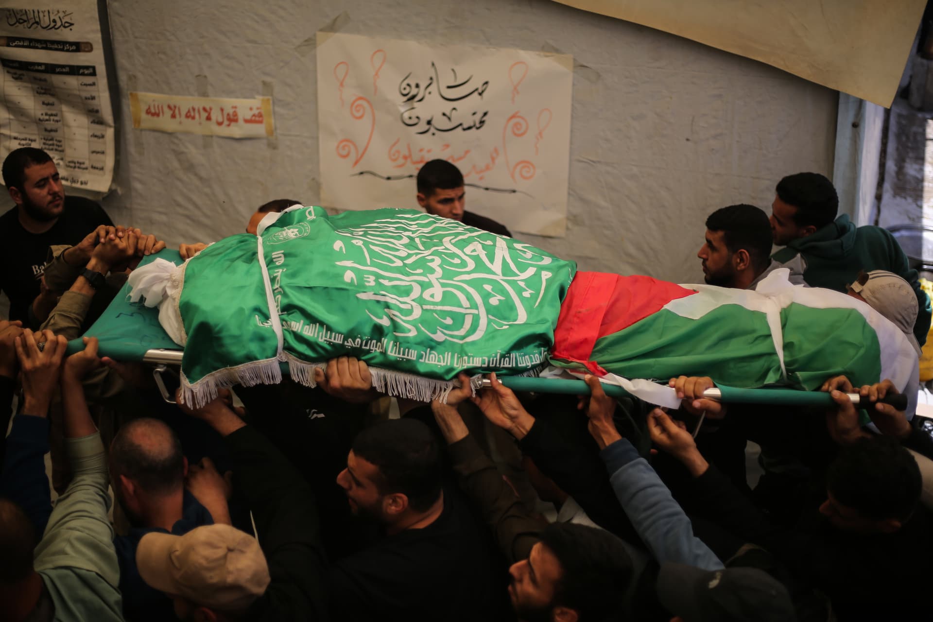 A funeral is held for Izz ad-Din al-Haddad, commander of Hamas's military wing, and his wife and daughter at the Al-Aqsa Martyrs Mosque at Gaza City on May 16, 2026.