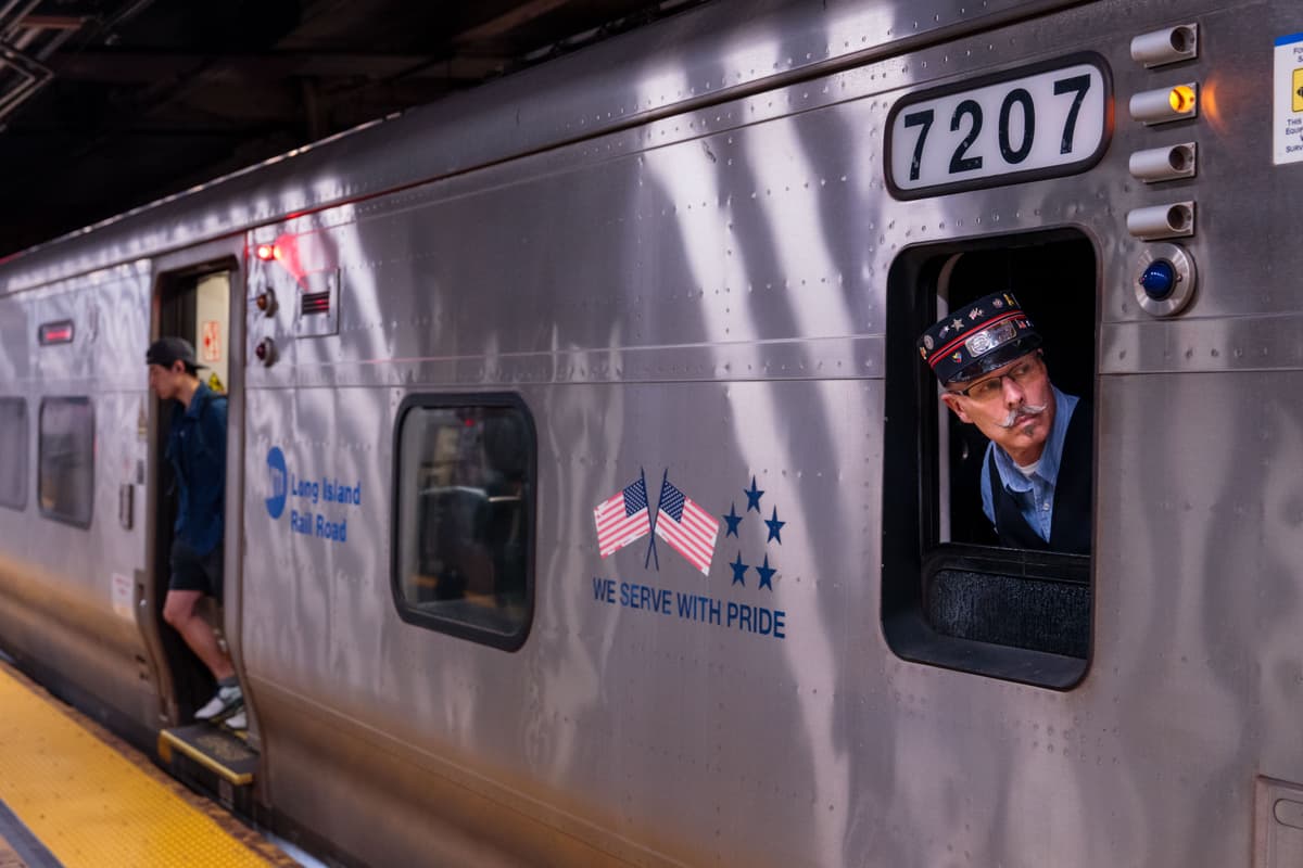 A conductor looks out of a Long Island Rail Road train at Penn Station at New York City on May 15, 2026, hours before the nation’s busiest commuter rail service was idled by a strike.