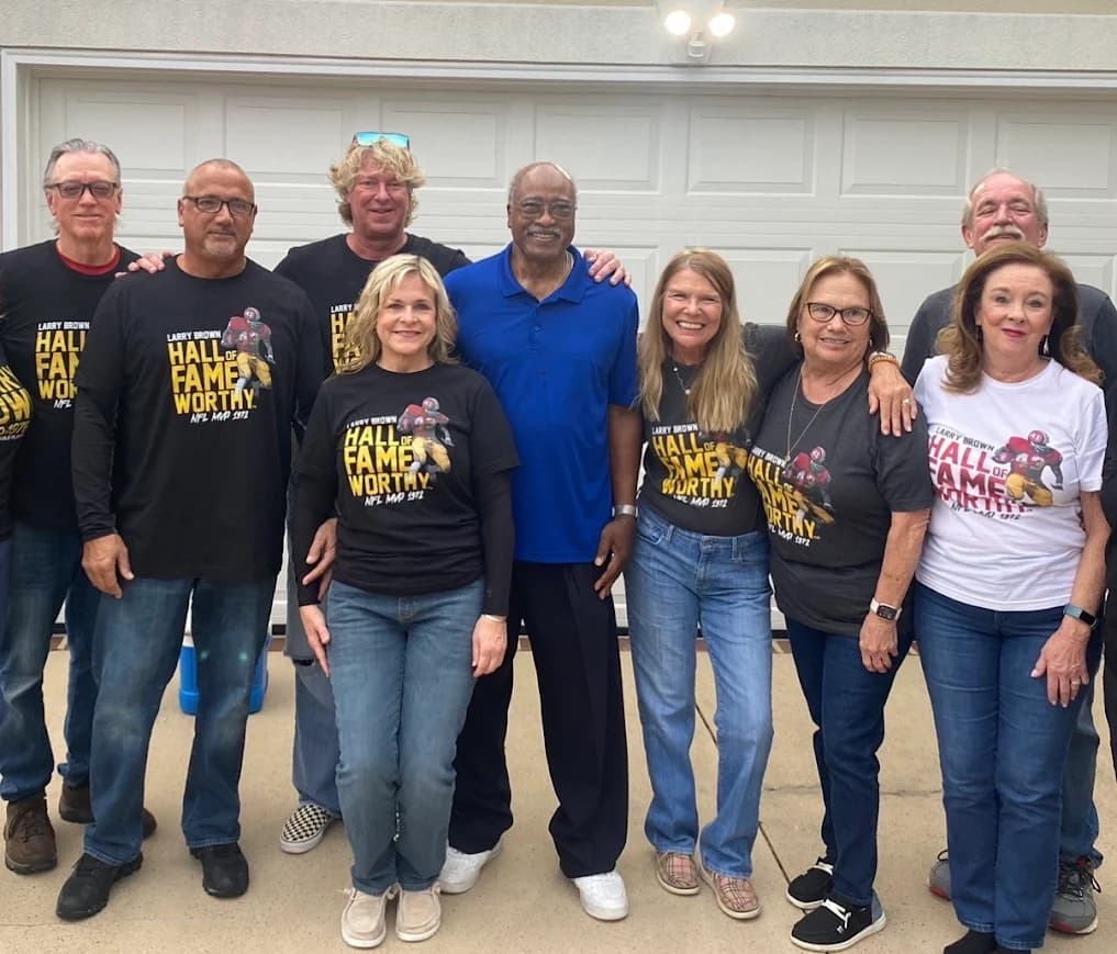 Larry Brown, middle in blue, is surrounded by friends in Myrtle Beach, South Carolina, wearing t-shirts promoting his quest for Hall of Fame consideration.