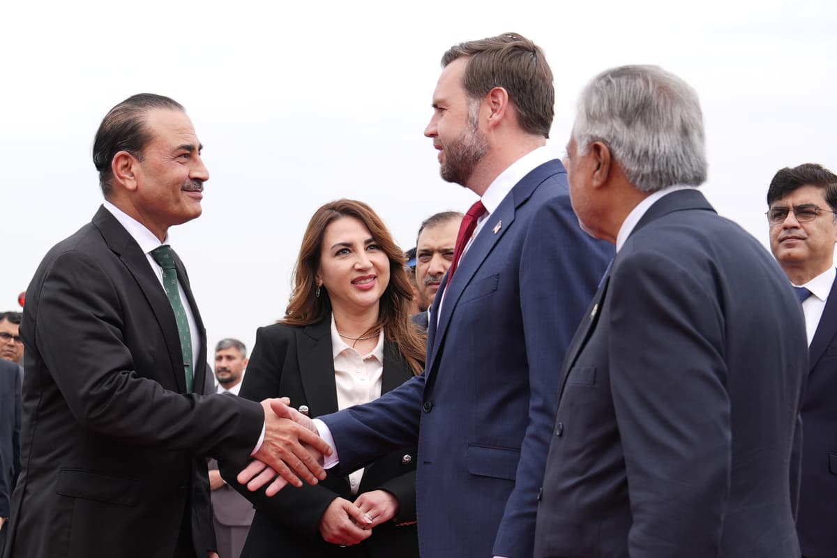 Pakistan's chief of defense forces, Field Marshall Asim Munir, shakes hands with Vice President Vance ahead of talks with Iranian officials at Islamabad on April 11, 2026.