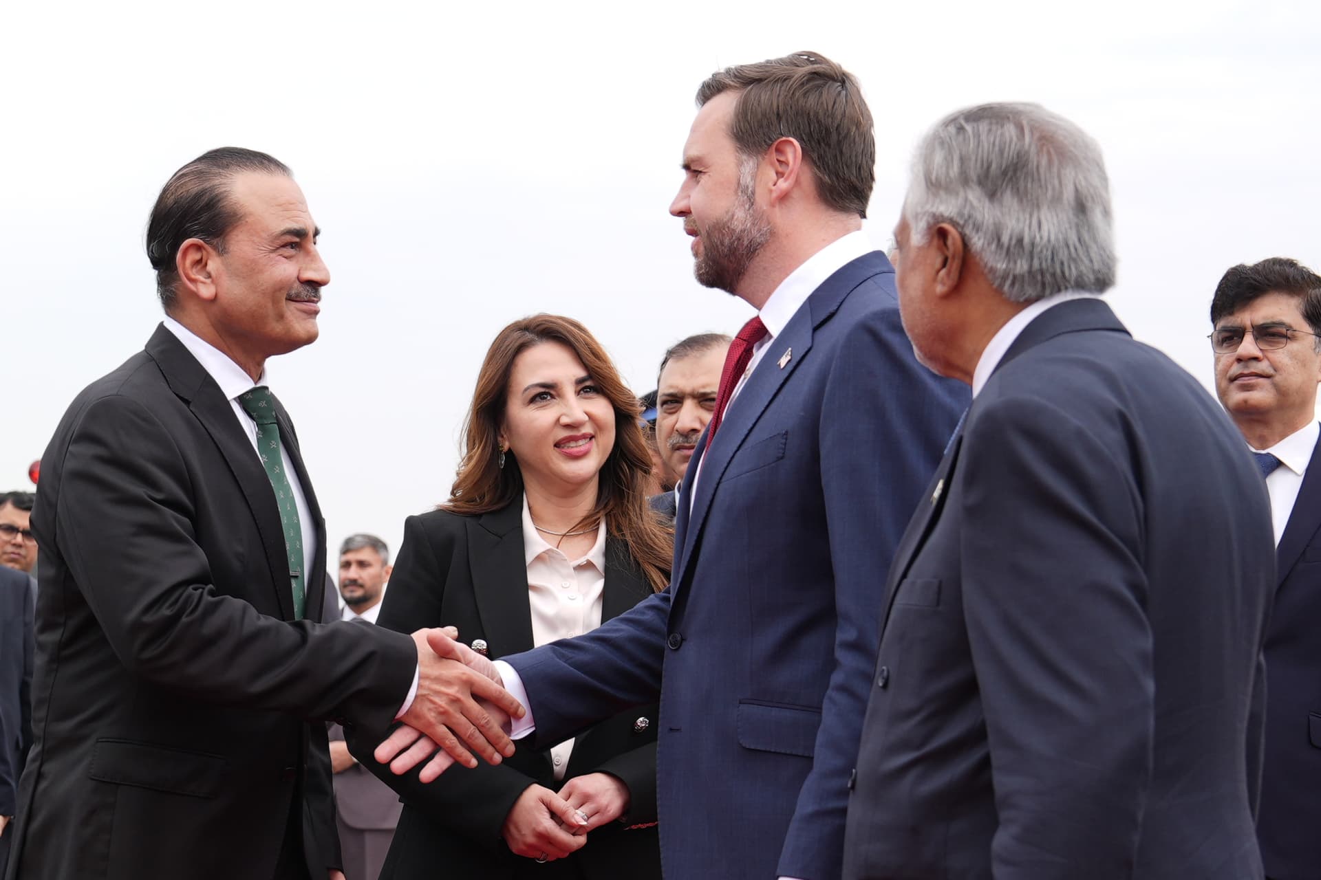 Pakistan's chief of defense forces, Field Marshall Asim Munir, shakes hands with Vice President Vance ahead of talks with Iranian officials at Islamabad on April 11, 2026.