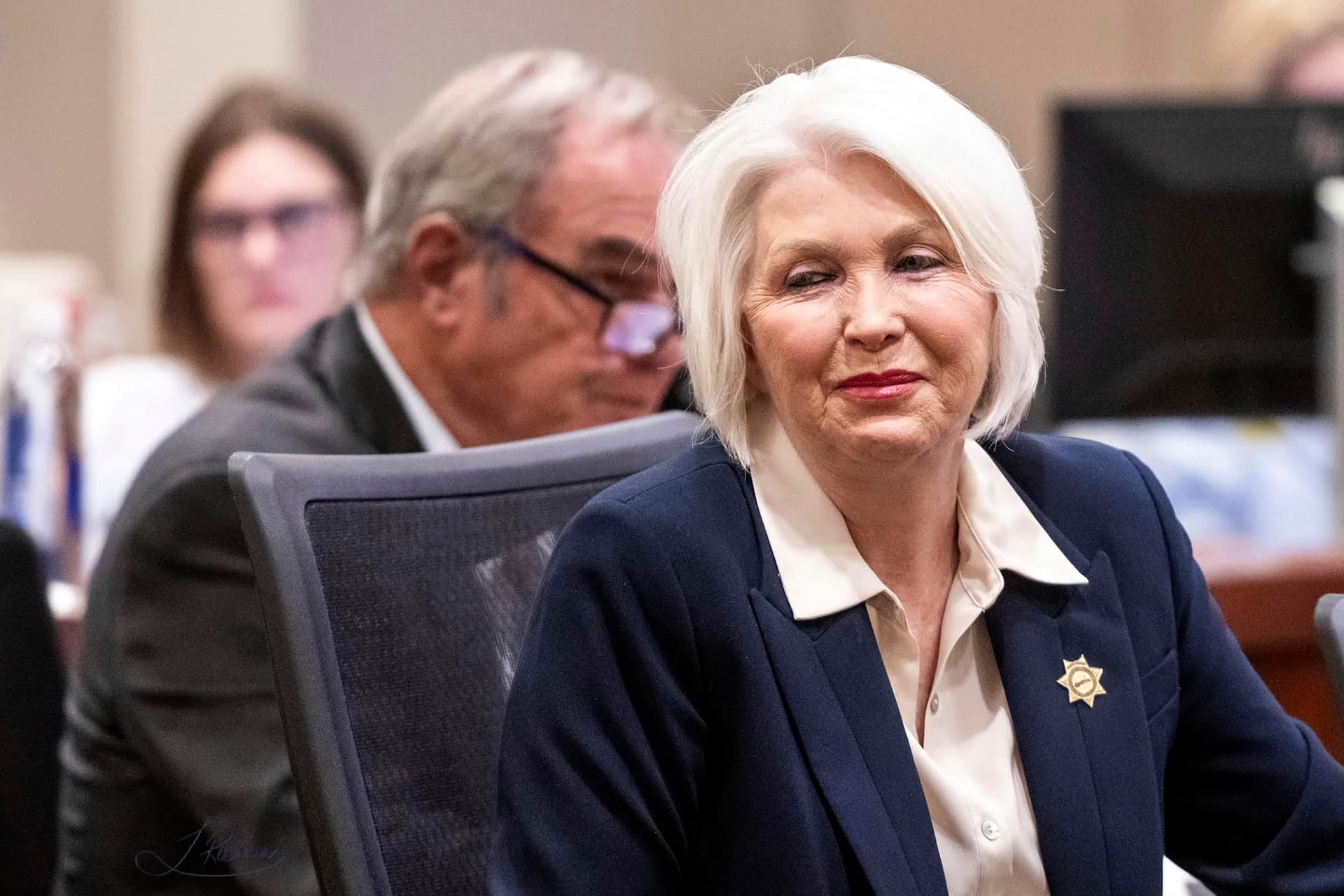 The former Mesa County clerk, Tina Peters, smiles at supporters  during her sentencing at Grand Junction, Colorado, on October 3, 2024.