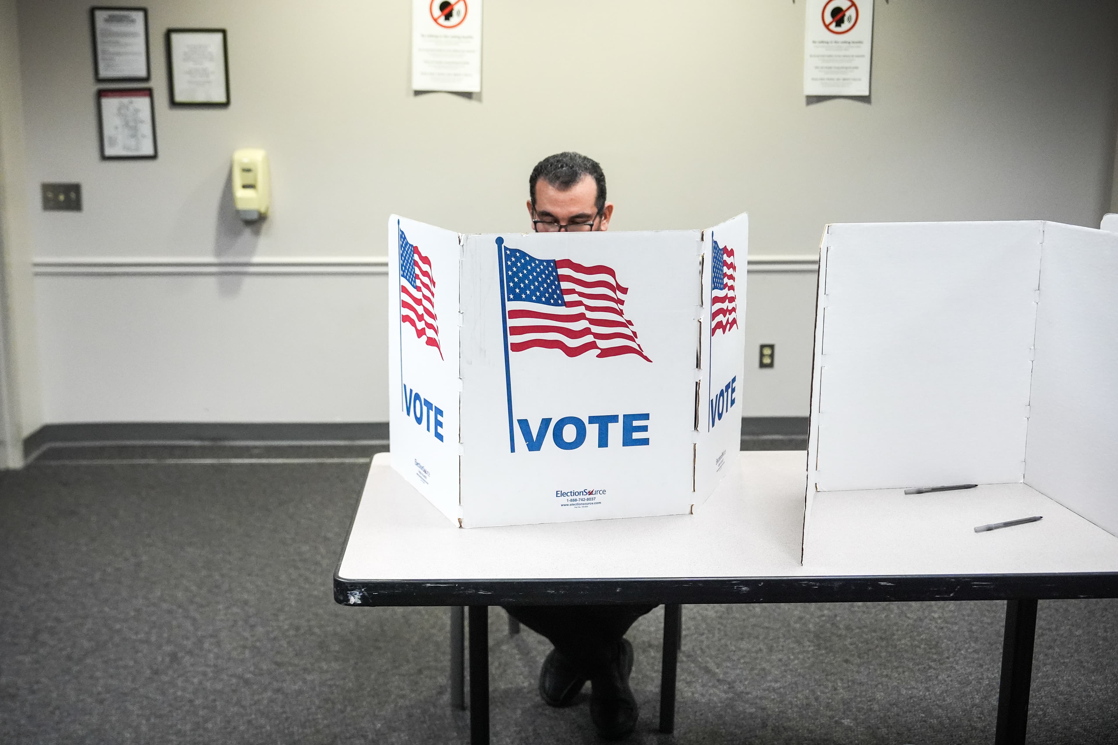 A voter fills out his ballot in a redistricting referendum at Fairfax, Virginia, on April 21, 2026.