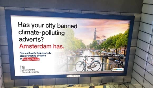Amsterdam is now the first capital city in the world to ban public advertisements it says promote a non-carbon neutral lifestyle.