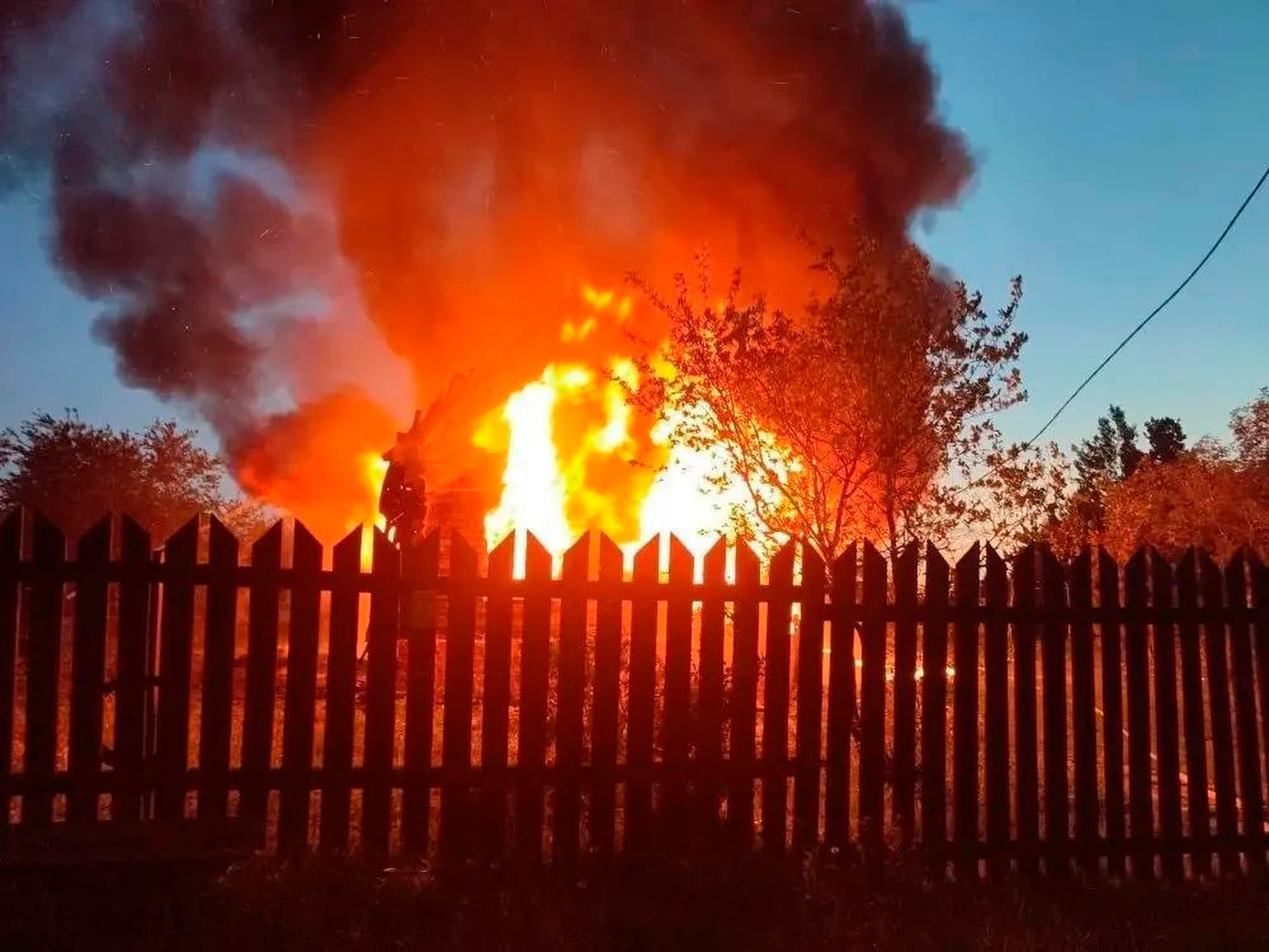 A house on fire after a Ukrainian attack at Khimki, just outside Moscow, Russia, on May 17, 2026. 
