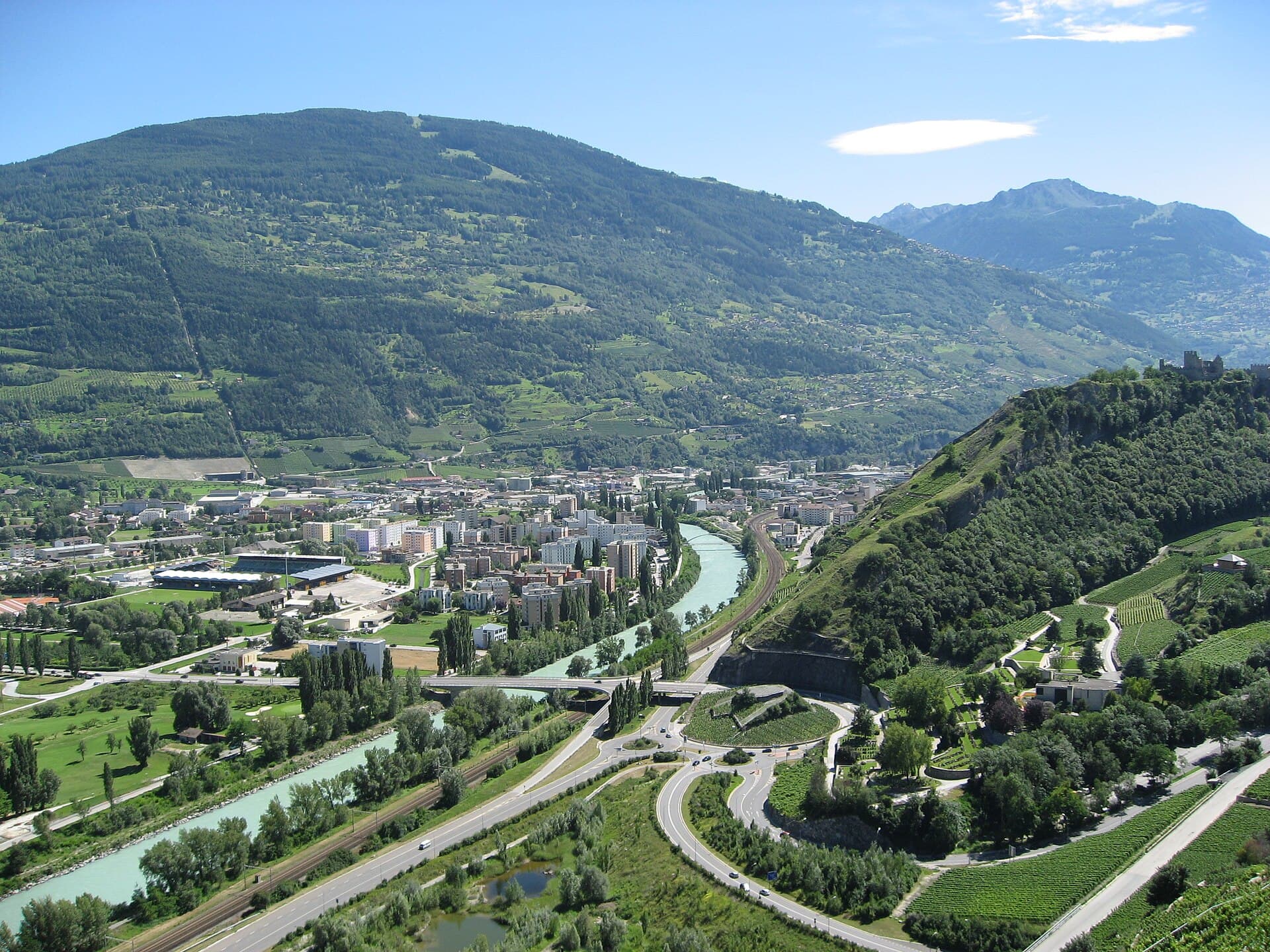 View of Sion from Bisse de Clavau in Switzerland's Rhone Valley.