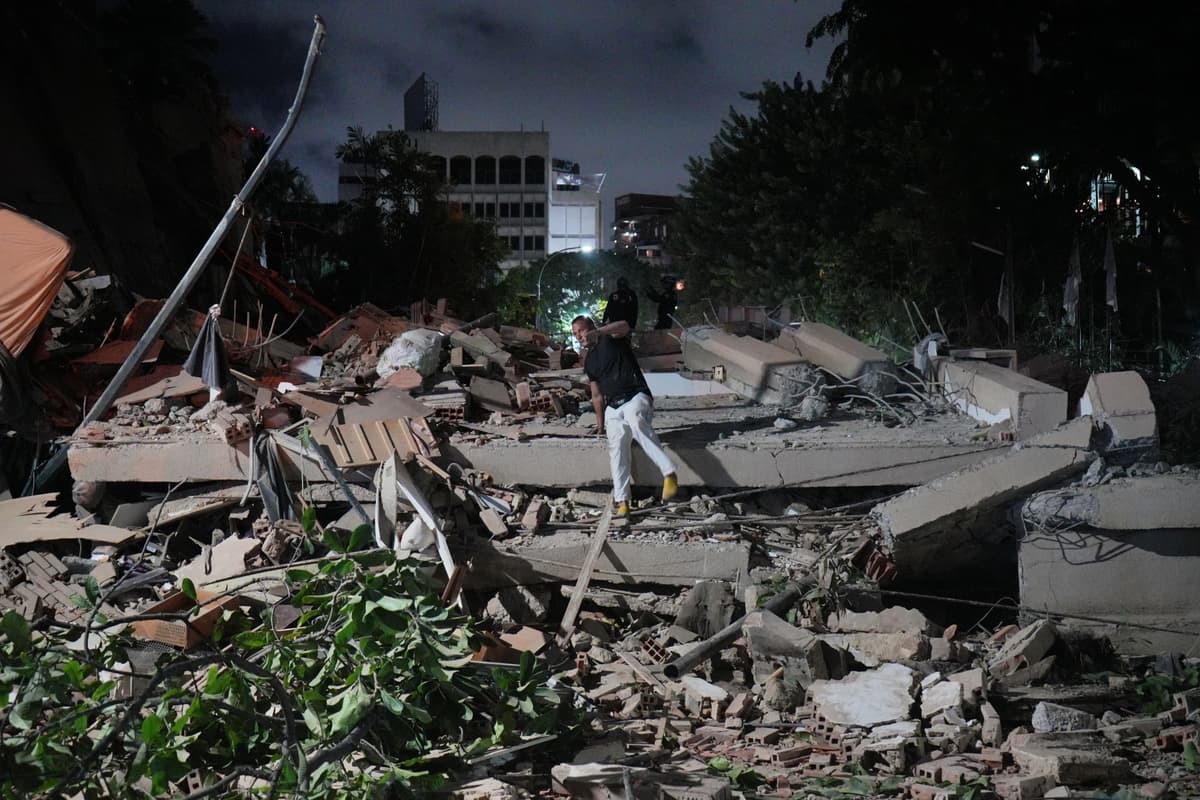 Rescue workers search for survivors at a collapsed building after an earthquake at Caracas, Venezuela, on June 24, 2026.