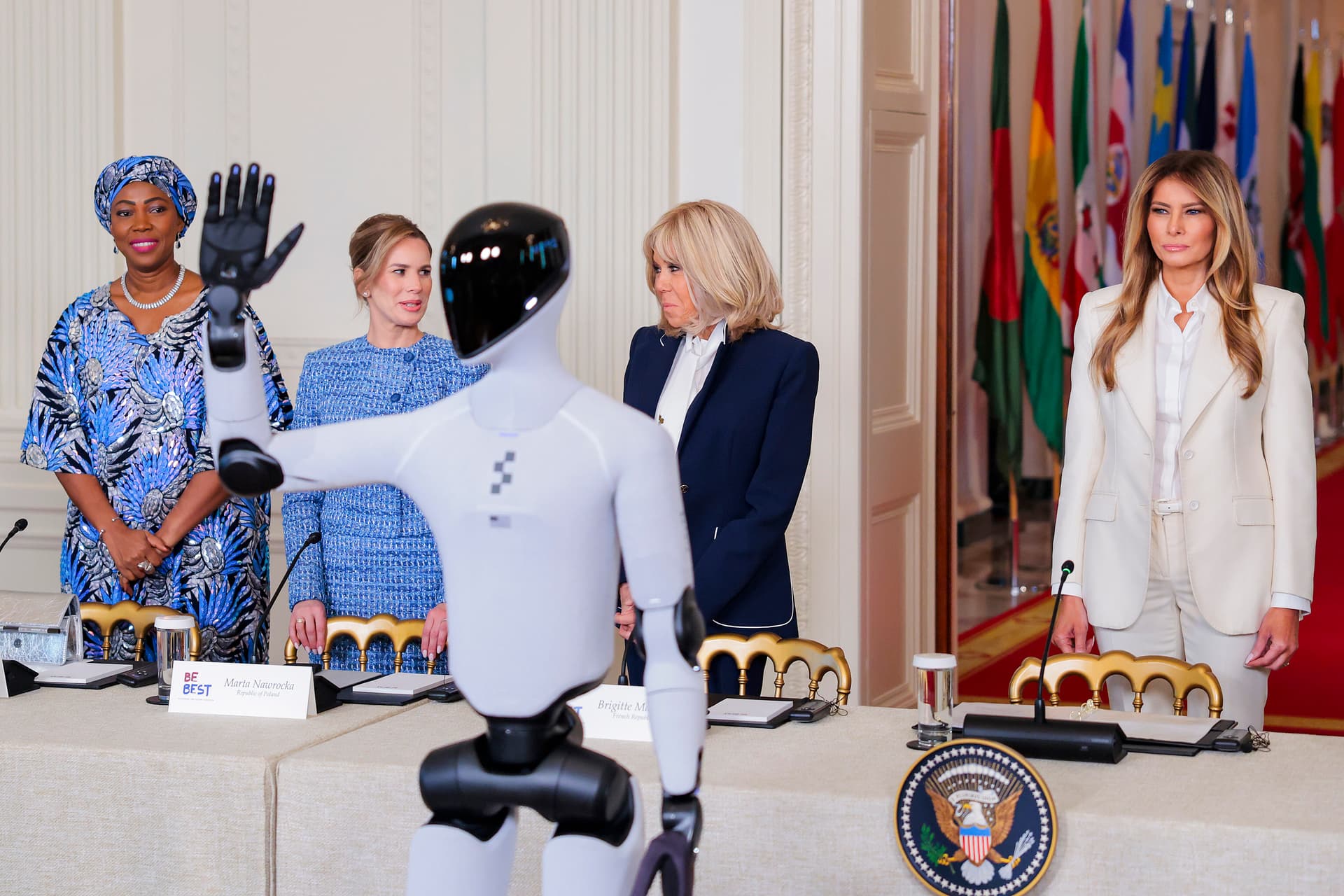 First lady Melania Trump hosts first lady of Sierra Leone, Fatima Maada Bio, first lady of Poland, Marta Nawrocka and first lady of France, Brigitte Macron in the East Room at the White House on March 25, 2026.