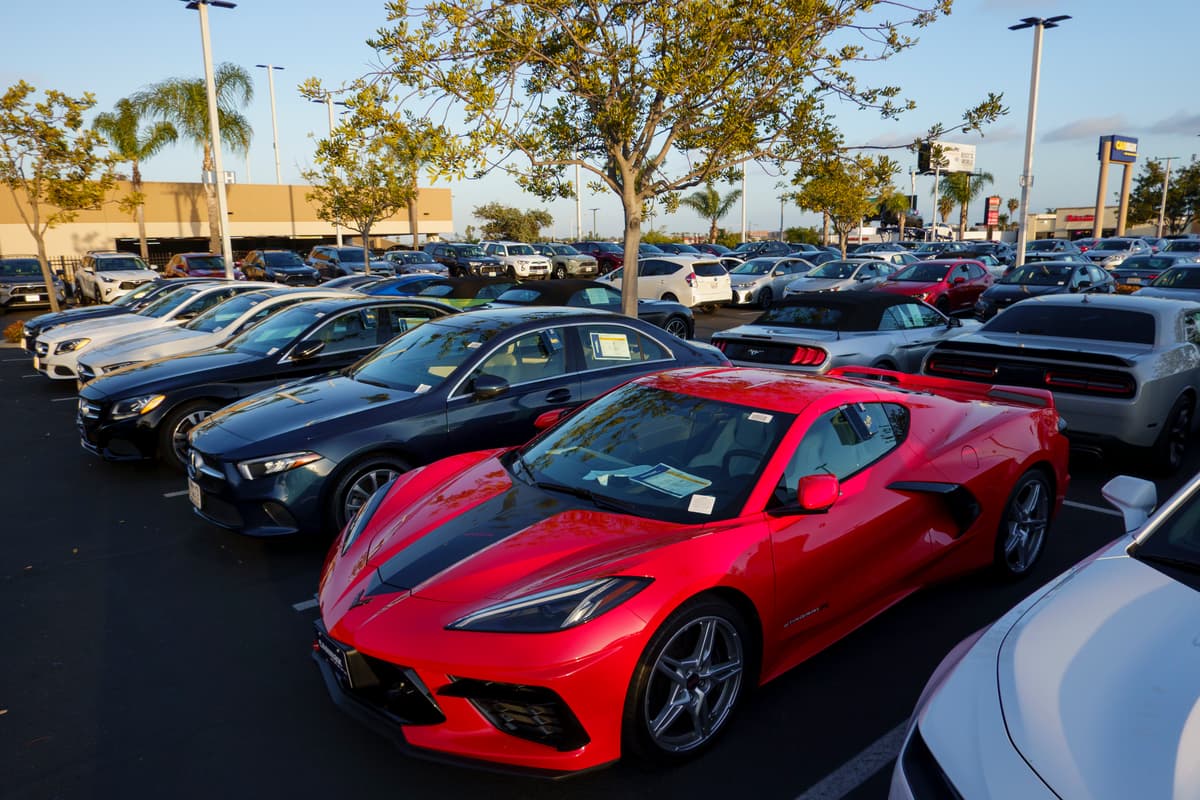 Vehicles for sale are parked in a lot at a CarMax dealership at San Diego, California, on April 24, 2025.