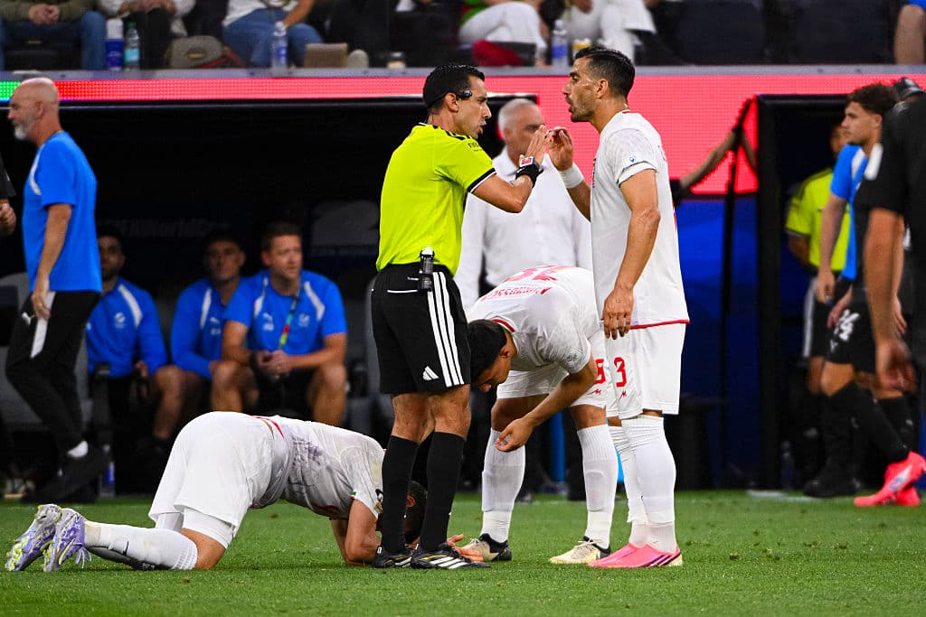 Referee César Palazuelos talks to players during the FIFA World Cup 2026 Group G match between Iran and New Zealand at Los Angeles Stadium on June 15, 2026. 