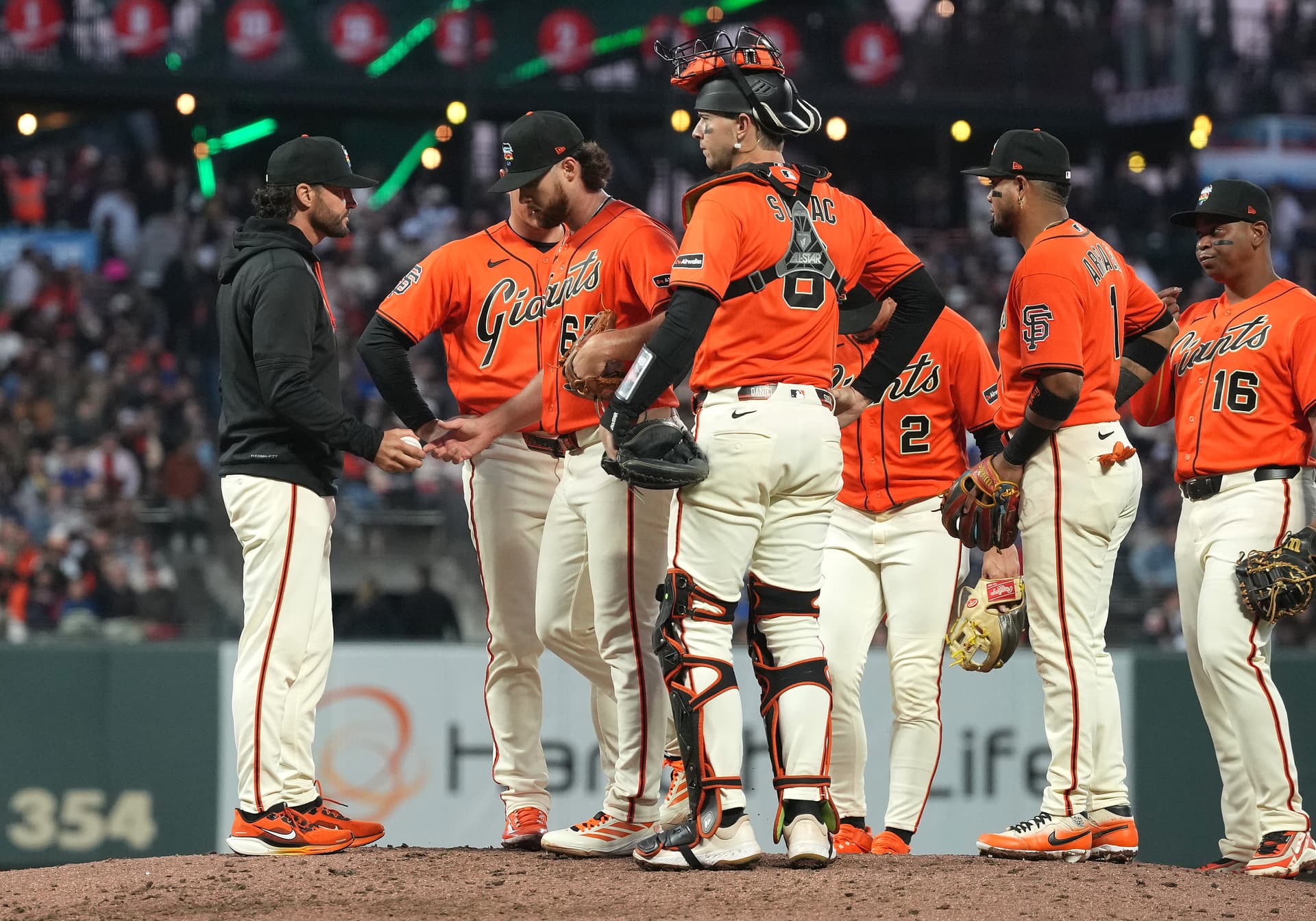 Manager Tony Vitello of the San Francisco Giants takes the ball from pitcher Landen Roupp, removing Mr. Roupp from the game at the top of the fifth inning against the Chicago Cubs at Oracle Park at San Francisco on June 12, 2026.