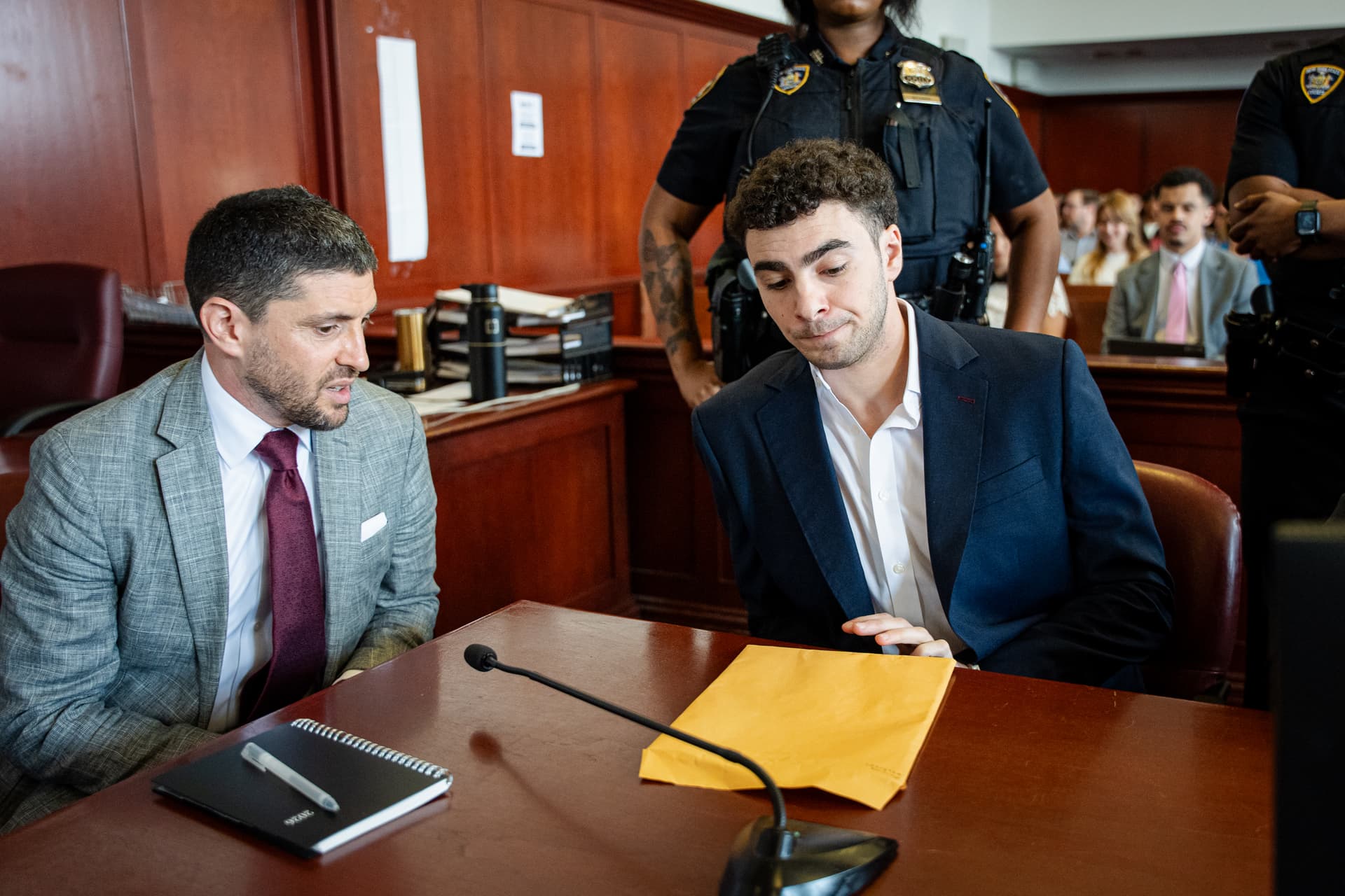 Luigi Mangione appears with lawyer Jacob Kaplan at a hearing at Manhattan Criminal Court on June 17, 2026, at New York City. Mr. Mangione is charged with murder in the shooting of UnitedHealthcare CEO Brian Thompson at Manhattan in December 2024. 