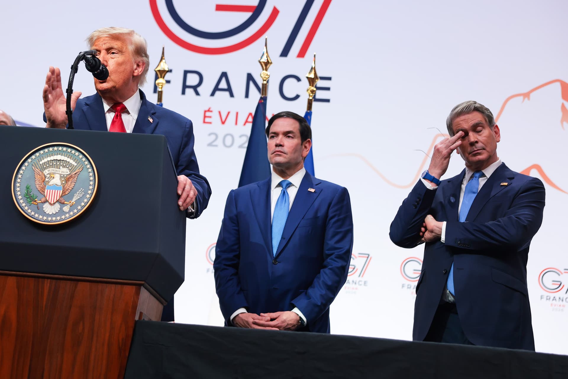 Secretary of State Marco Rubio and U.S. Treasury Secretary Scott Bessent look on as President Trump speaks at a press conference during the G7 Leaders' Summit on June 17, 2026 at Evian-les-Bains, France. 