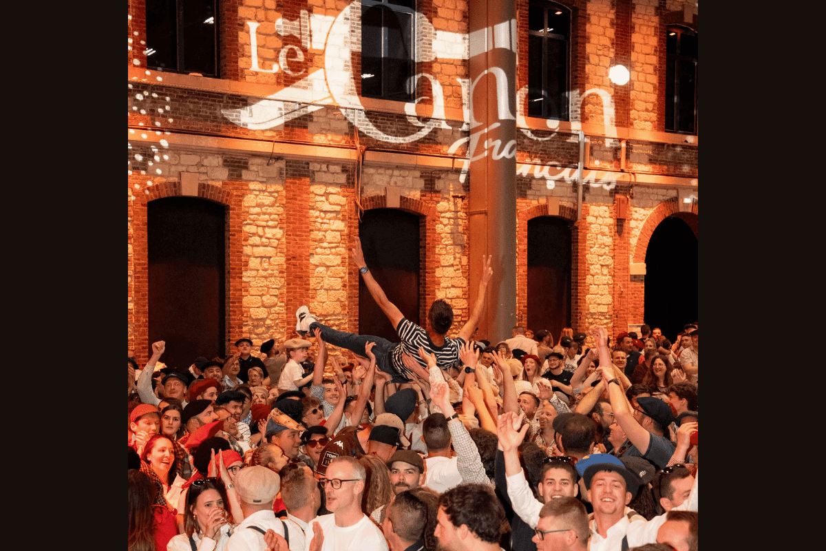 Partygoers dance to music at a banquet hosted by Le Canon Français at Troyes, Champagne Region, France on May 25, 2026.