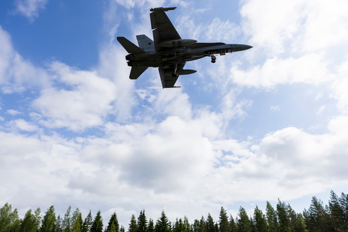 A F/A-18 Hornet fighter of the Finnish Air Force lands on a road strip during a NATO exercise at Tervo, Finland, on June 10, 2026.