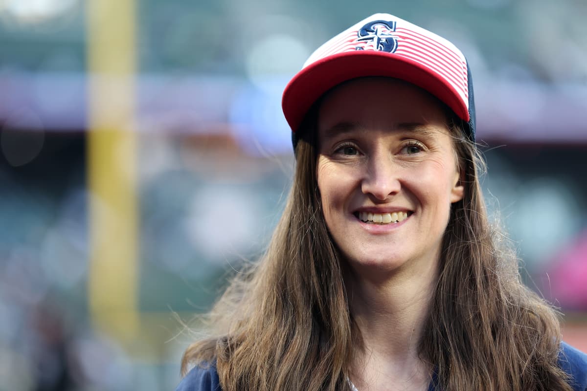 Mayor Katie Wilson of Seattle looks on after the ceremonial first pitch before a baseball game between the Seattle Mariners and the New York Yankees at Seattle on March 30, 2026.