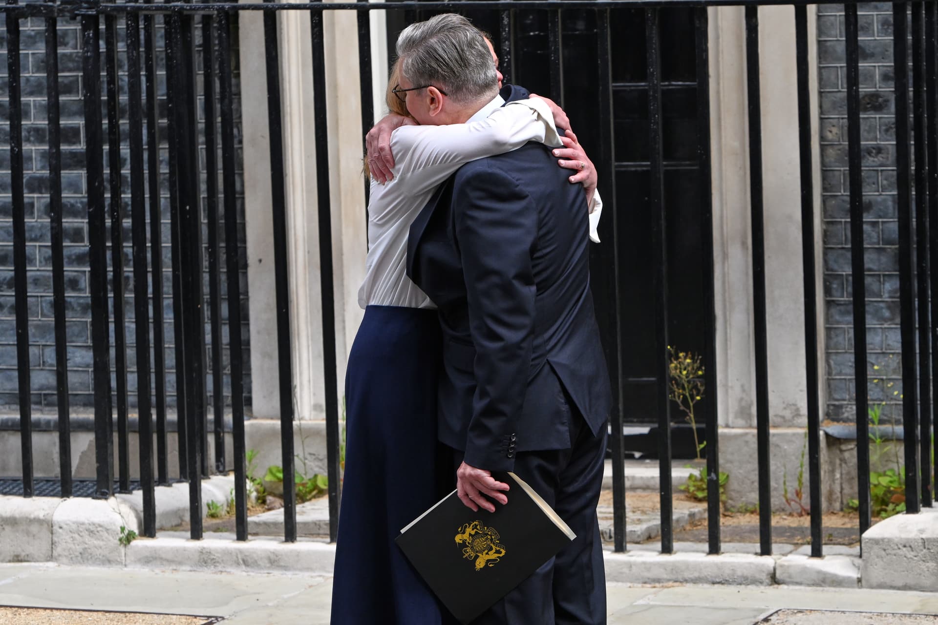 Britain's prime minister, Keir Starmer, hugs his wife Victoria after announcing his resignation outside 10 Downing Street at London on June 22, 2026.