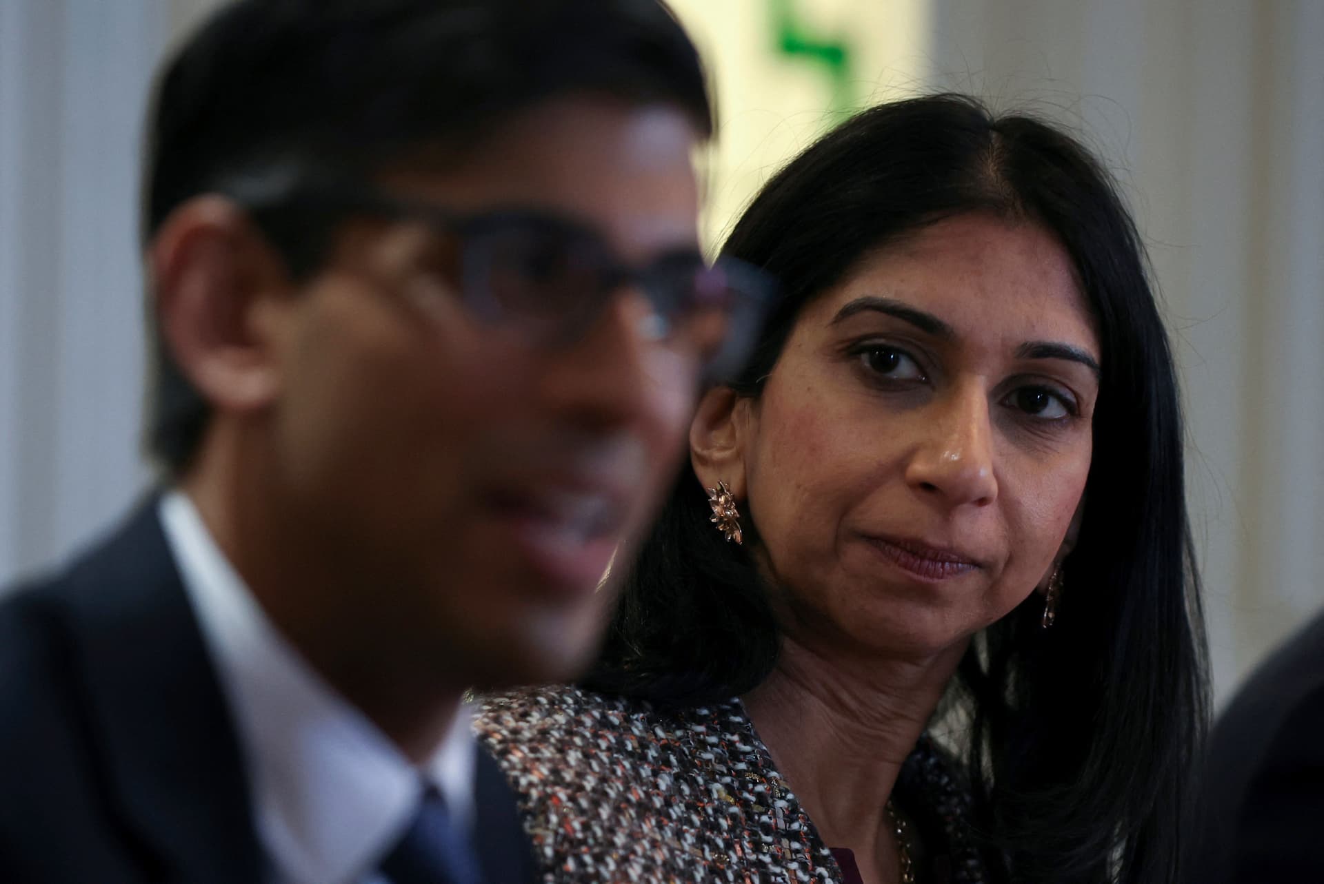 Britain's former Prime Minister, Rishi Sunak, left, and Britain's former Home Secretary, Suella Braverman, attend a meeting with the local community and police leaders following the announcement of a new police task force to help officers tackle grooming gangs, in Rochdale, England, April 3, 2023.