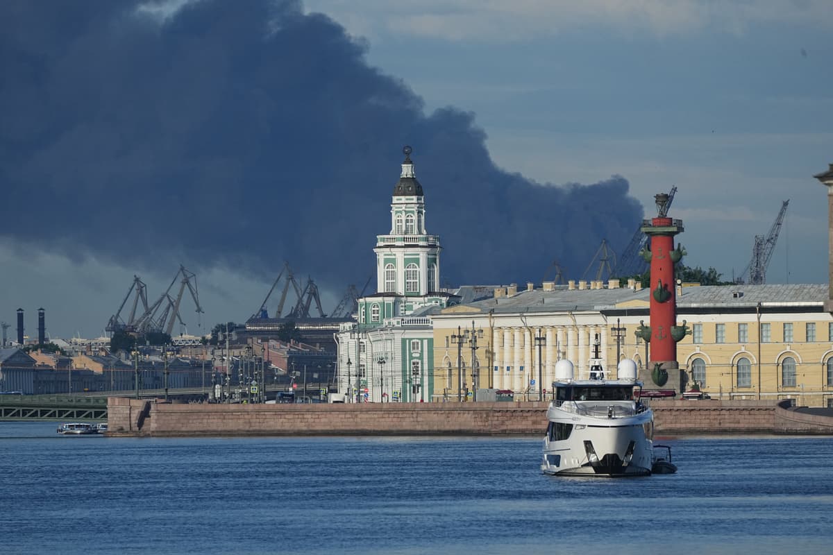 A plume of black smoke is seen over the port of St. Petersburg on June 3, 2026, after a Ukrainian drone attack.