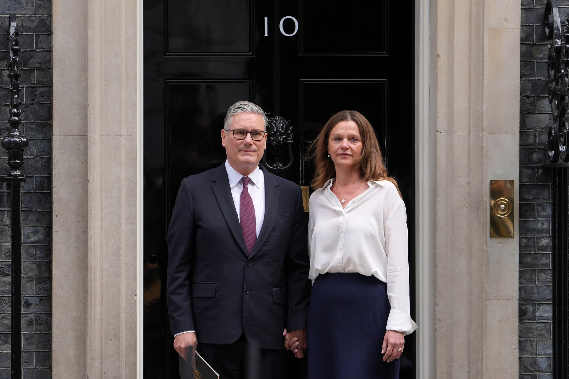 Prime Minister Keir Starmer and his wife Victoria stand in front of 10 Downing Street,  June 22, 2026
