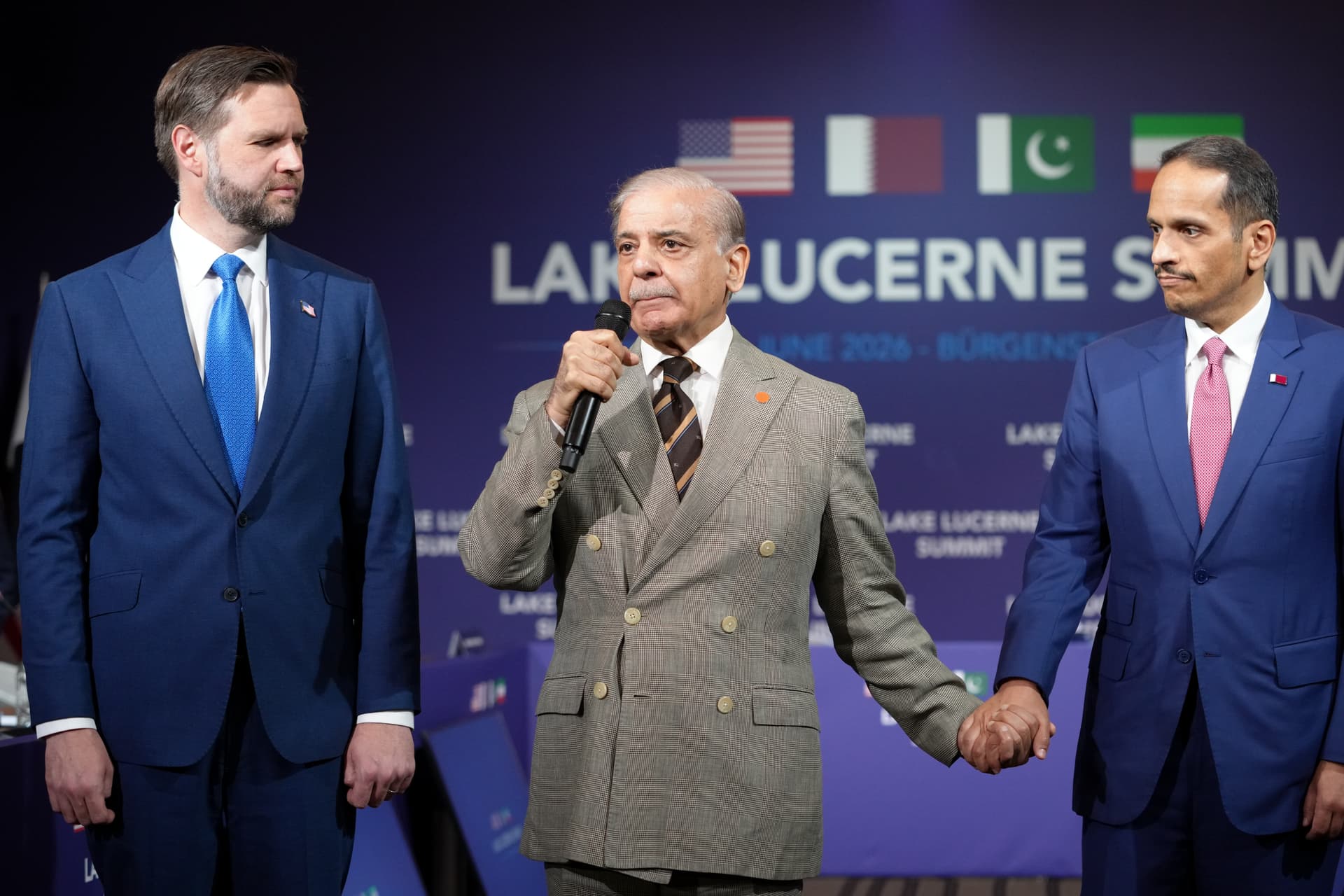 Pakistan's Prime Minister Shehbaz Sharif speaks next to Vice President JD Vance and Qatar's Prime Minister and Minister for Foreign Affairs, Sheikh Mohammed bin Abdulrahman bin Jassim Al-Thani, during a quadrilateral meeting between the U.S., Iran, Pakistan, and Qatar at the Lake Lucerne Summit June 21, 2026 near Stansstad, Switzerland. 