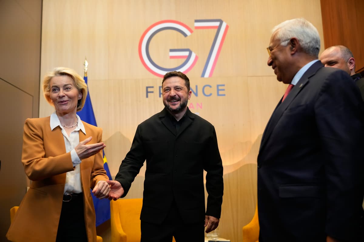 Ukrainian President Volodymyr Zelenskyy, center, meets with European Commission President Ursula von der Leyen, left, and European Council President Antonio Costa, right, at the G7 summit in Evian-les-Bains, France, Tuesday, June 16, 2026. 