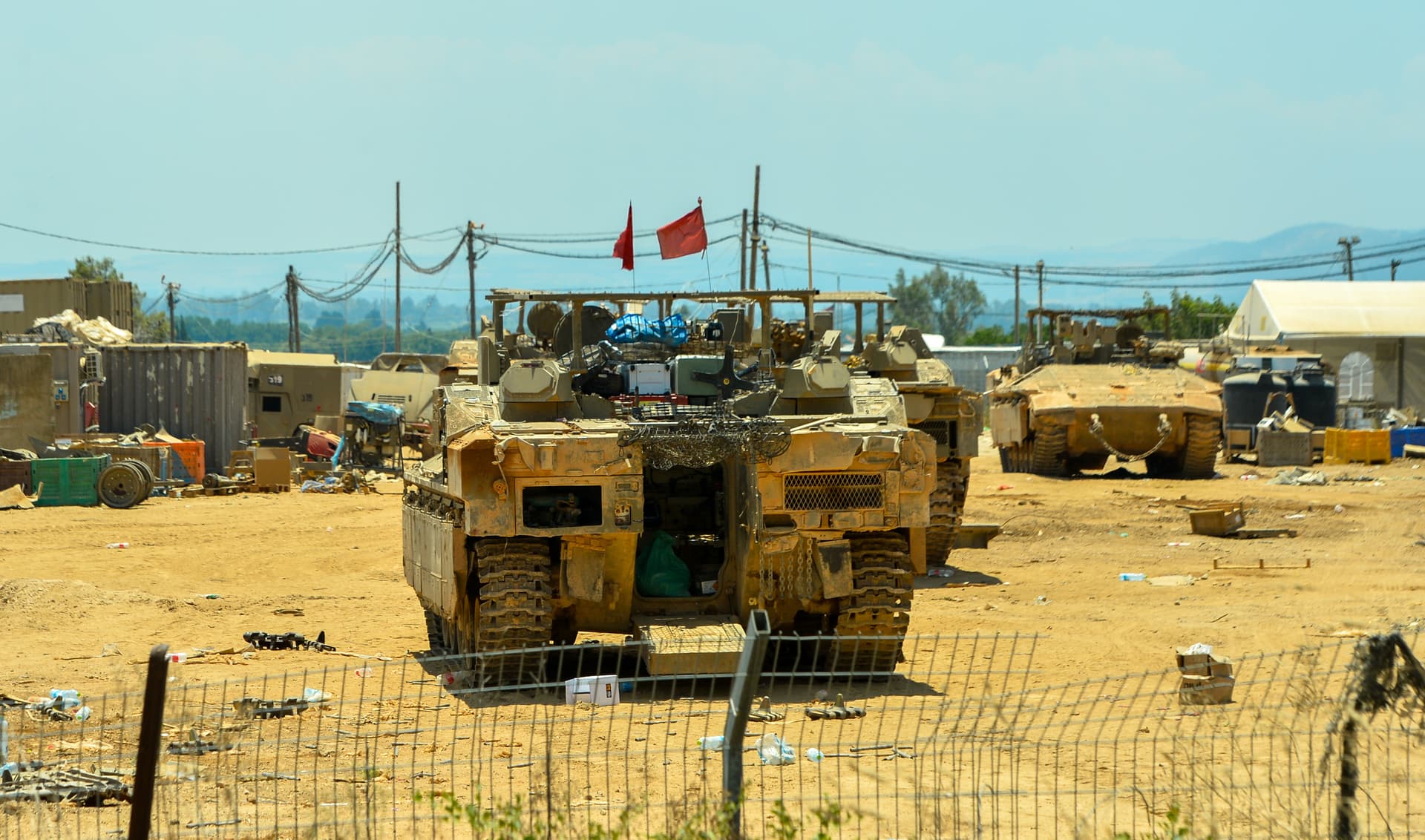Israeli military vehicles are seen at Kiryat Shemona near Israel's border with Lebanon on July 7, 2026.