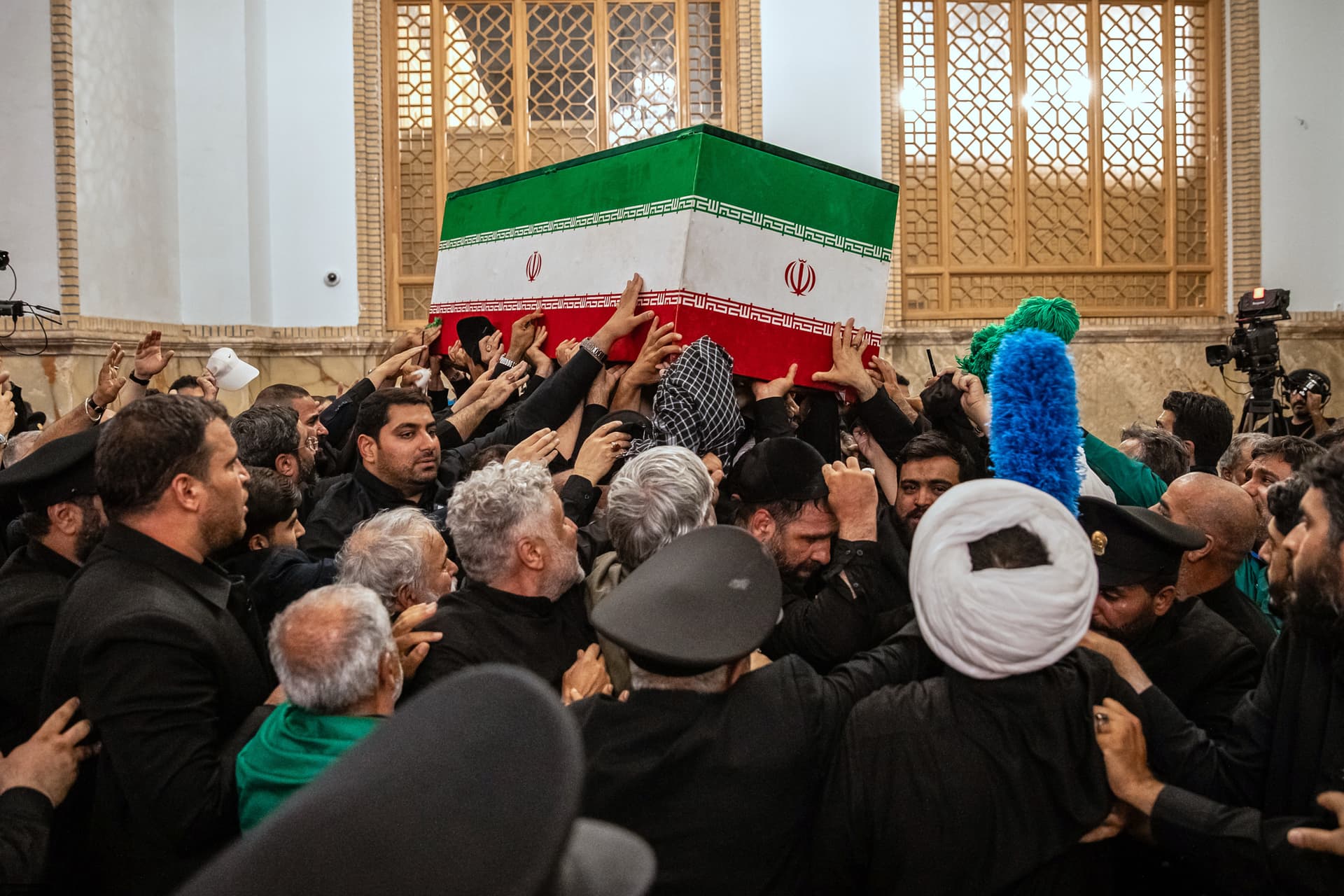 Mourners carry the coffin of the late Iranian supreme leader, Ayatollah Ali Khamenei, for the final prayer before his burial at the Imam Reza Shrine at Mashhad, northeastern Iran, on July 9, 2026.