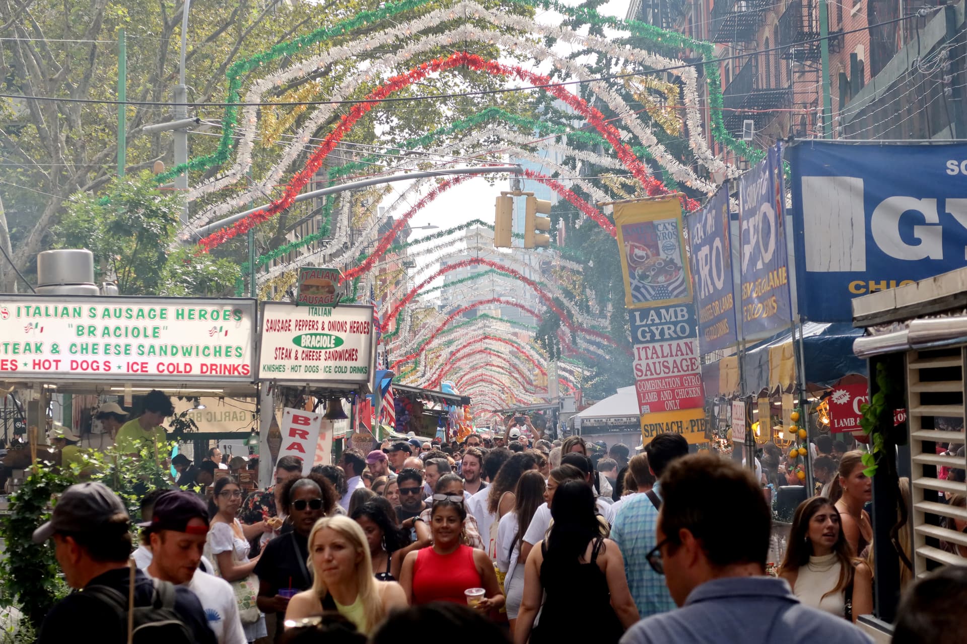 Visitors attend the Feast of Gennaro festival on Little Italy’s Mulberry Street at New York City on September 17, 2023.
