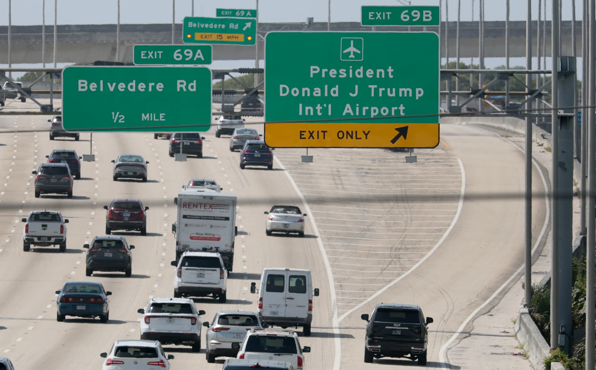 A sign on I-95 directs drivers to the President Donald J. Trump International Airport at Palm Beach, Florida, on July 09, 2026.
