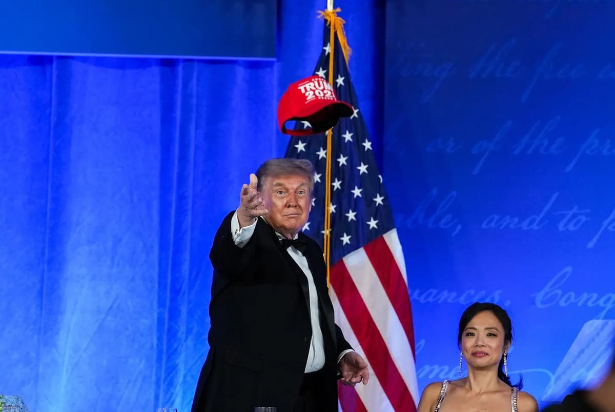 President Donald Trump tosses a TRUMP 2028 hat to an attendee during the rescheduled White House Correspondents Dinner at the Waldorf Astoria at Washington, D.C., on July 24, 2026.
