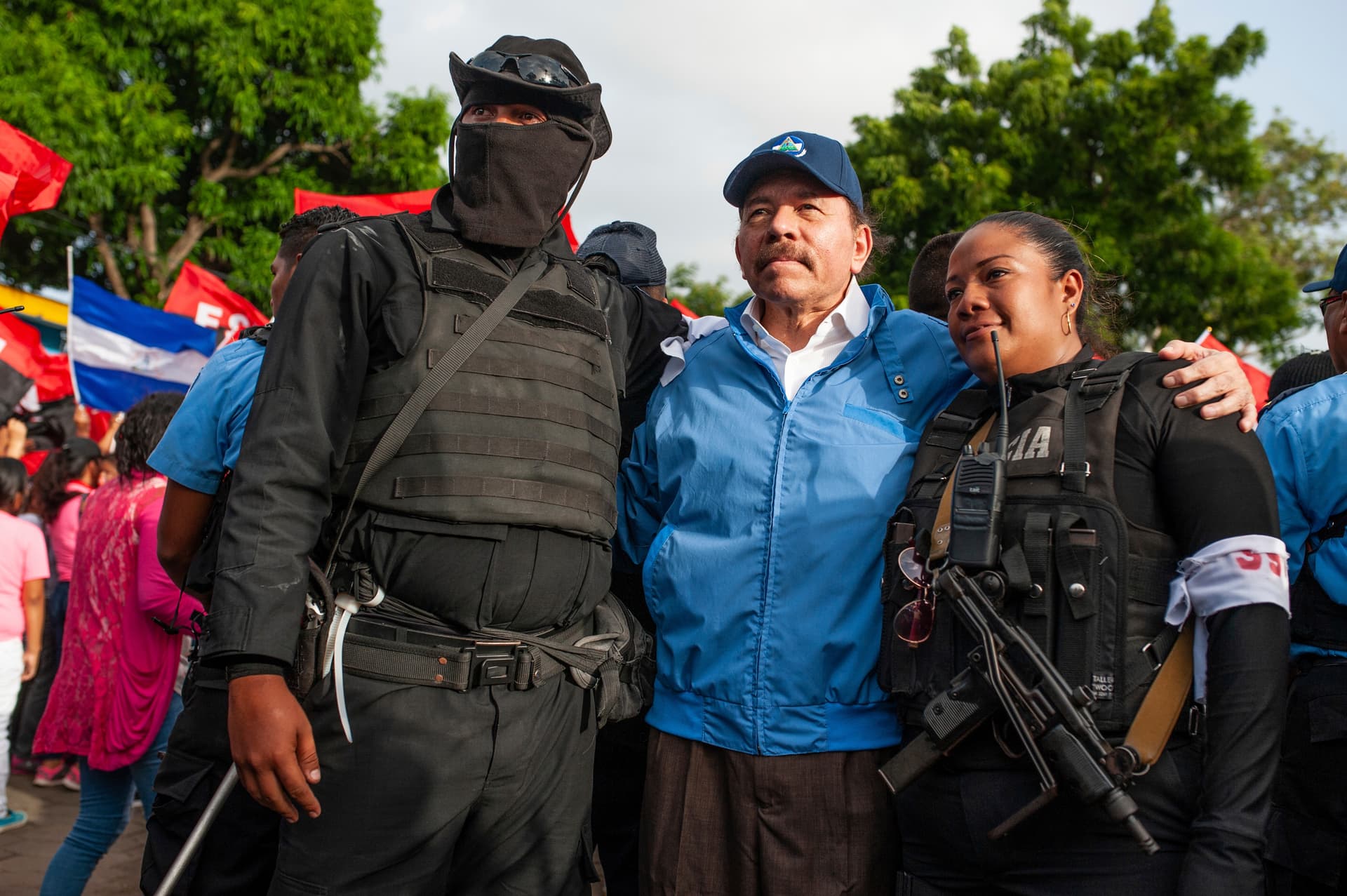President Daniel Ortega, center, with police officers at Masaya, Nicaragua, on July 13, 2018. 
