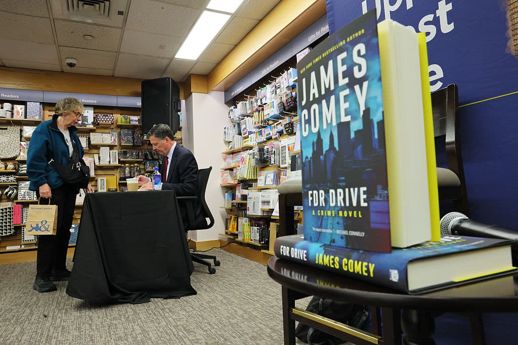 Author James Comey, former FBI Director, signs copies of his books at Barnes & Noble on May 19, 2025, at New York City.