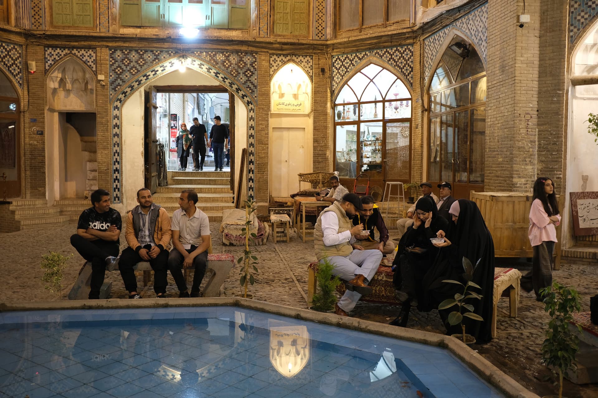 Customers sit in a traditional tea house at Kashan, Iran, on March 26, 2026.