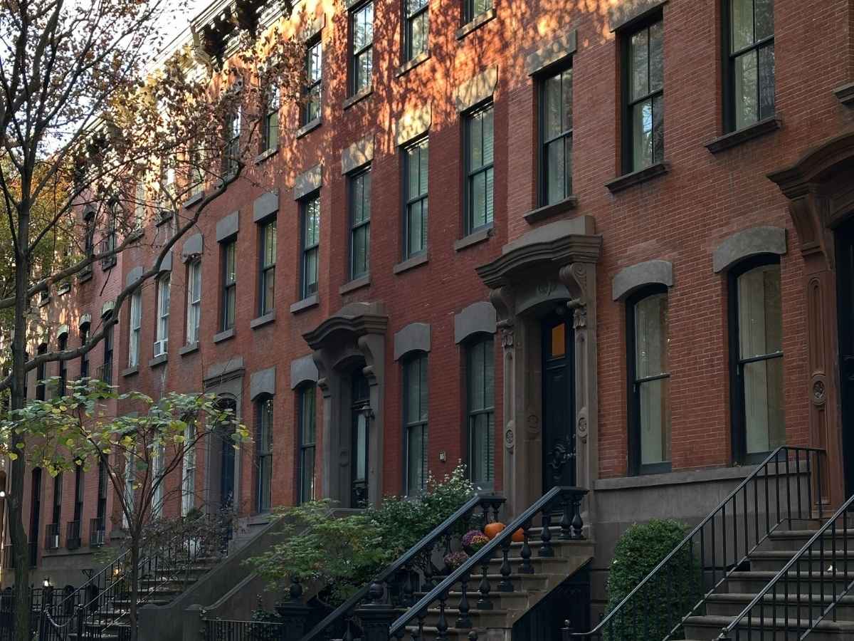 New York City brownstones are in a different tax class than condos and co-ops, which benefit from lower assessments as a result of an archaic formula from the 1980s.