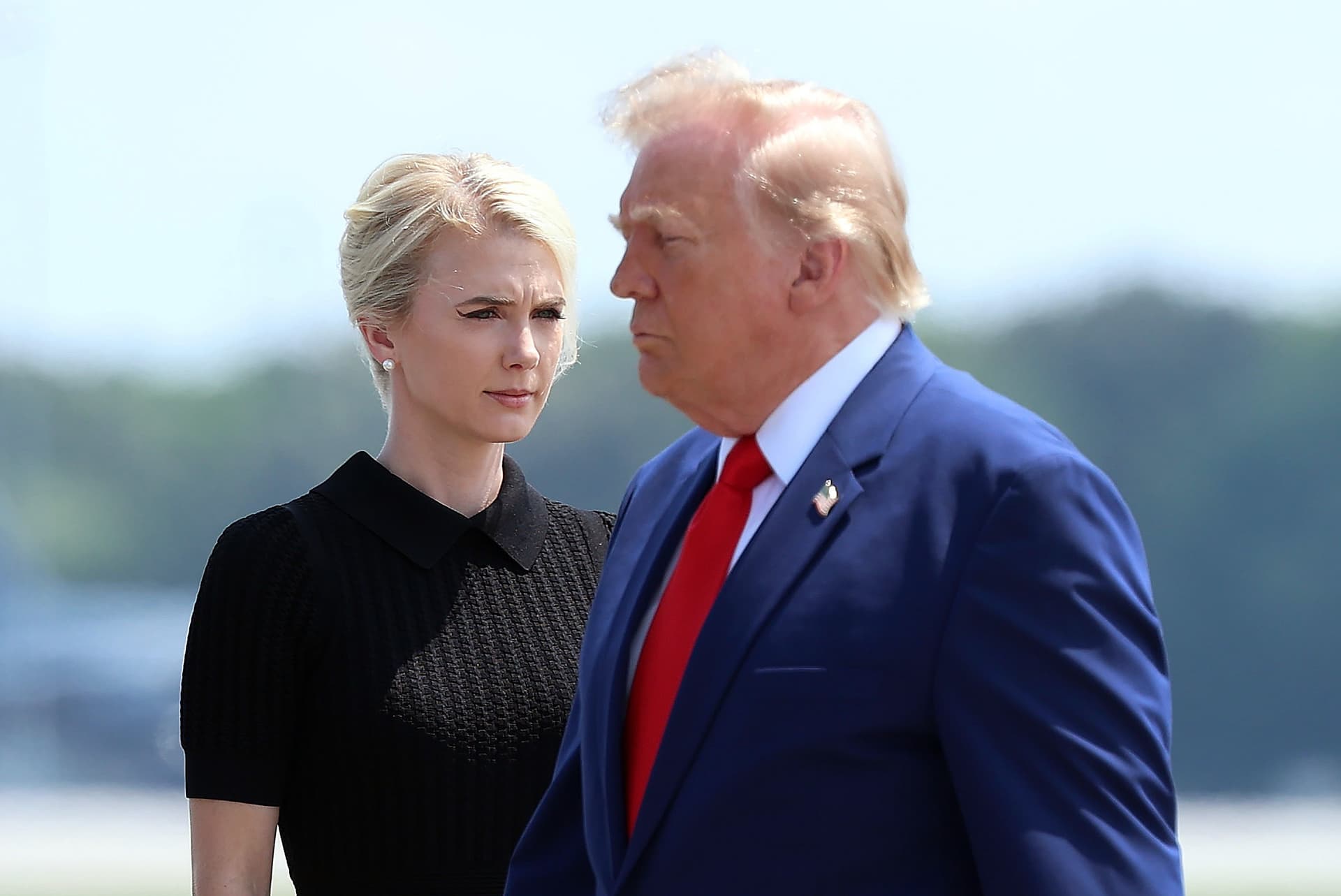 The executive assistant to the president, Natalie Harp, left, and President Trump on July 22, 2026 at Dover, Delaware. 