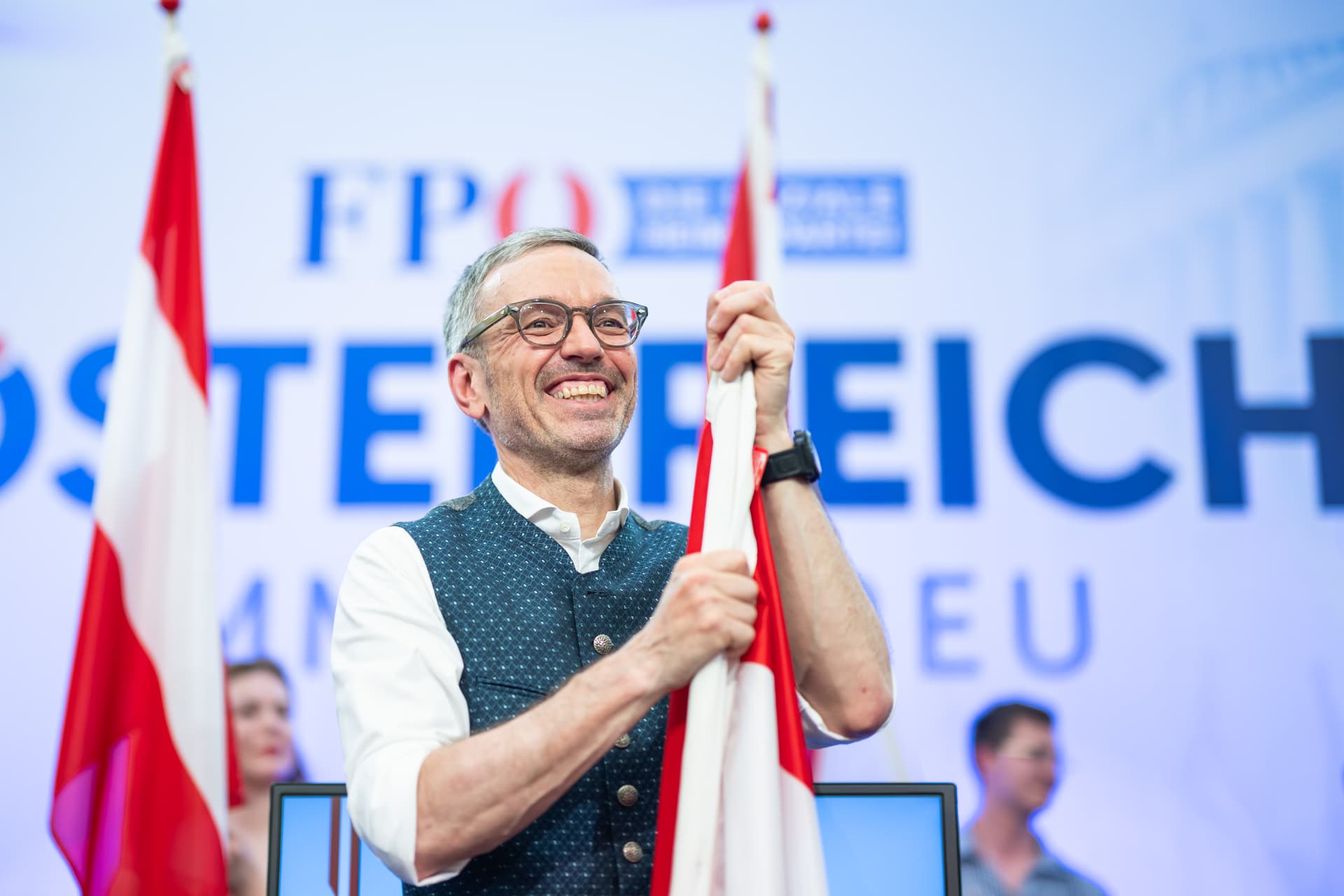 The leader of the far-right Freedom Party of Austria, Herbert Kickl, displays an Austrian flag at a May Day gathering on May 1, 2025 at Linz, Austria. 