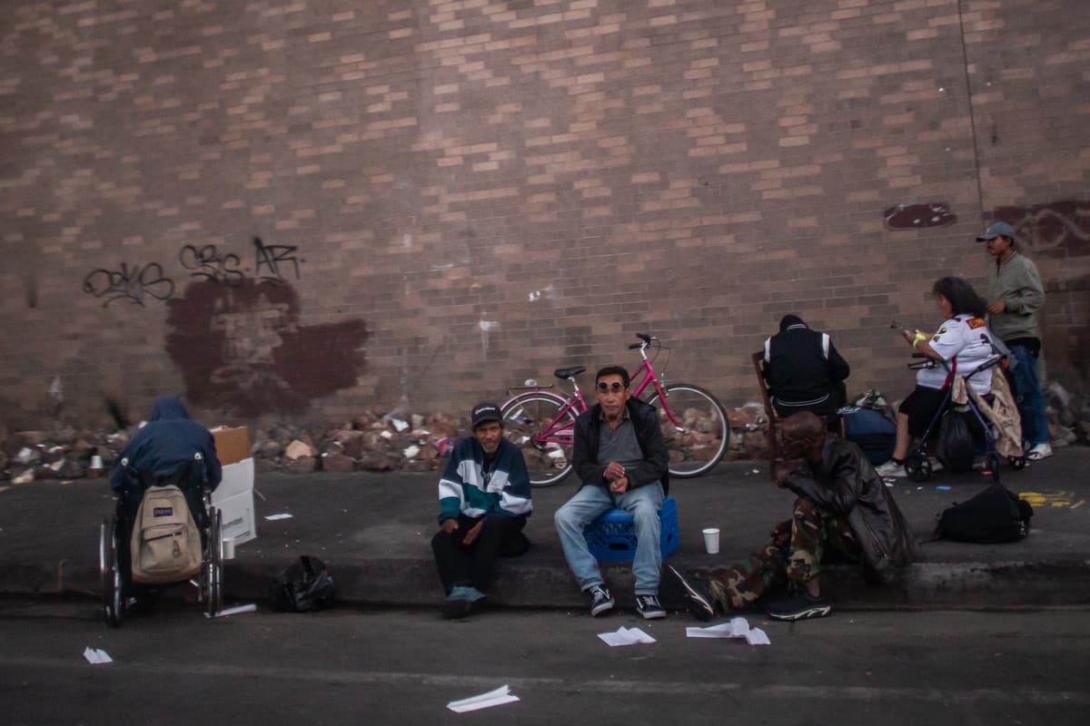Homeless people are seen in Skid Row on July 25, 2025, at downtown Los Angeles.