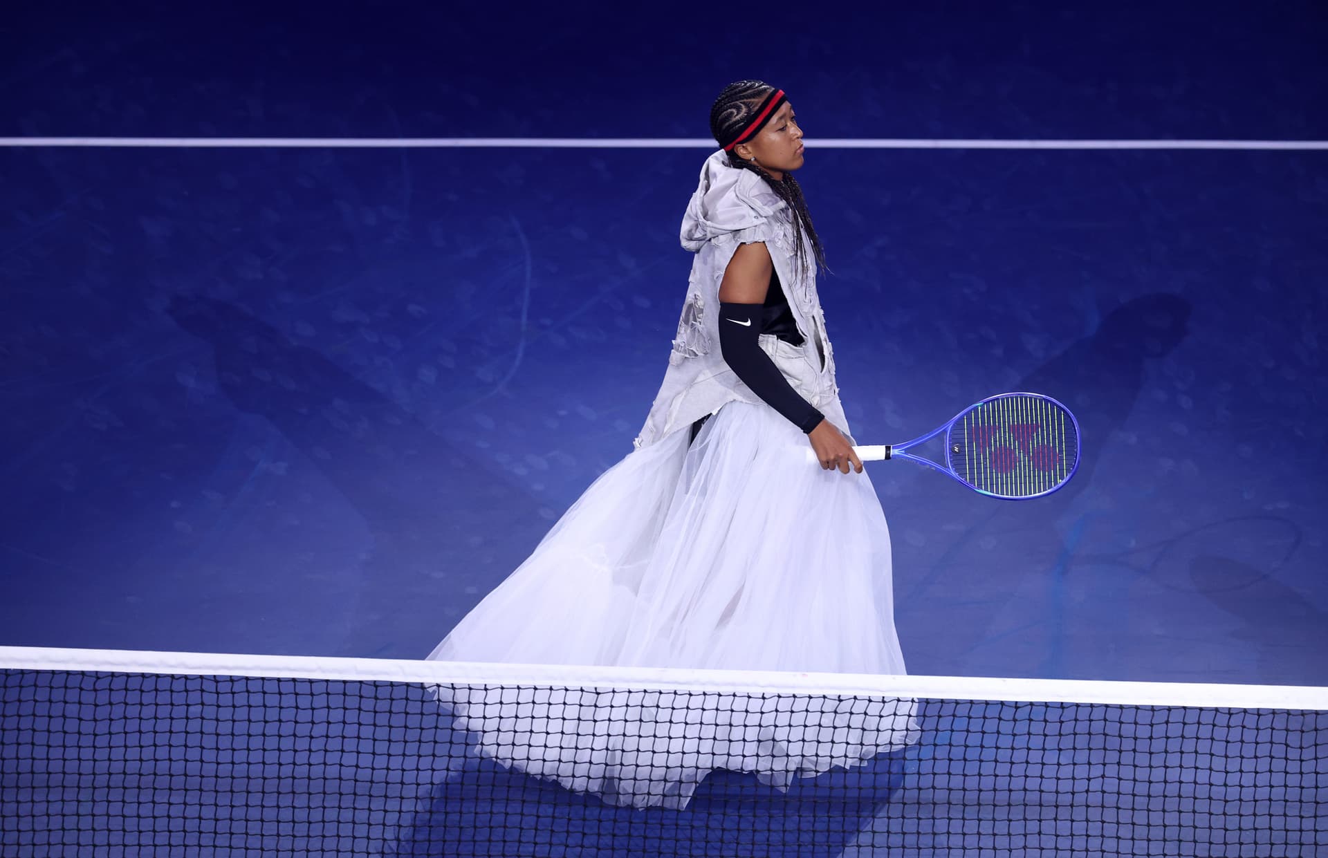 Naomi Osaka of Japan walks onto the court against Anastasia Zakharova during their Women's Singles first round match on day two of the 2026 U.S. Open at the Billie Jean King National Tennis Center on August 31, 2026, at Flushing, New York. 