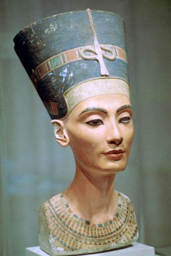 Limestone head of Queen Nefertiti, wife of Akhenaten, from El Amarna, Egypt. Now in the Egyptian Museum, Berlin.