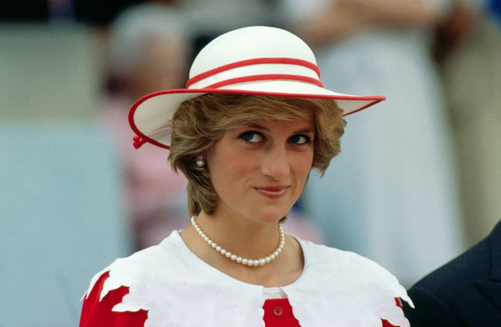 Diana, Princess of Wales, wears an outfit in the colors of Canada during a state visit to Edmonton, Alberta, with her husband in 1983.