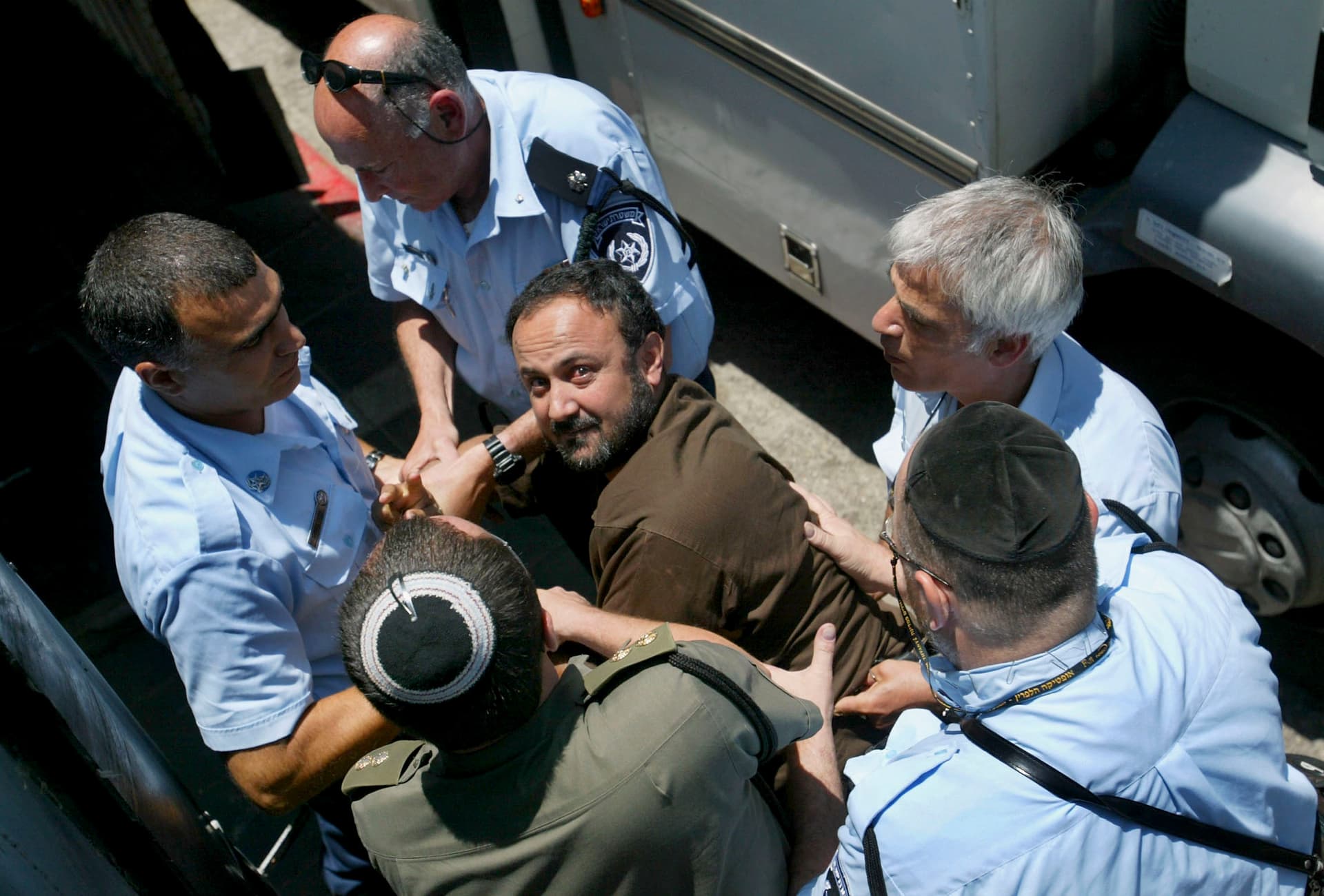 Marwan Barghouti is taken to court by Israeli police on June 6, 2004.