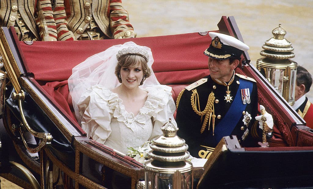 Diana, Princess of Wales, wearing the Spencer family Tiara, ride in an open carriage, from St. Paul's Cathedral to Buckingham Palace on July 29, 1981 at London, England. 