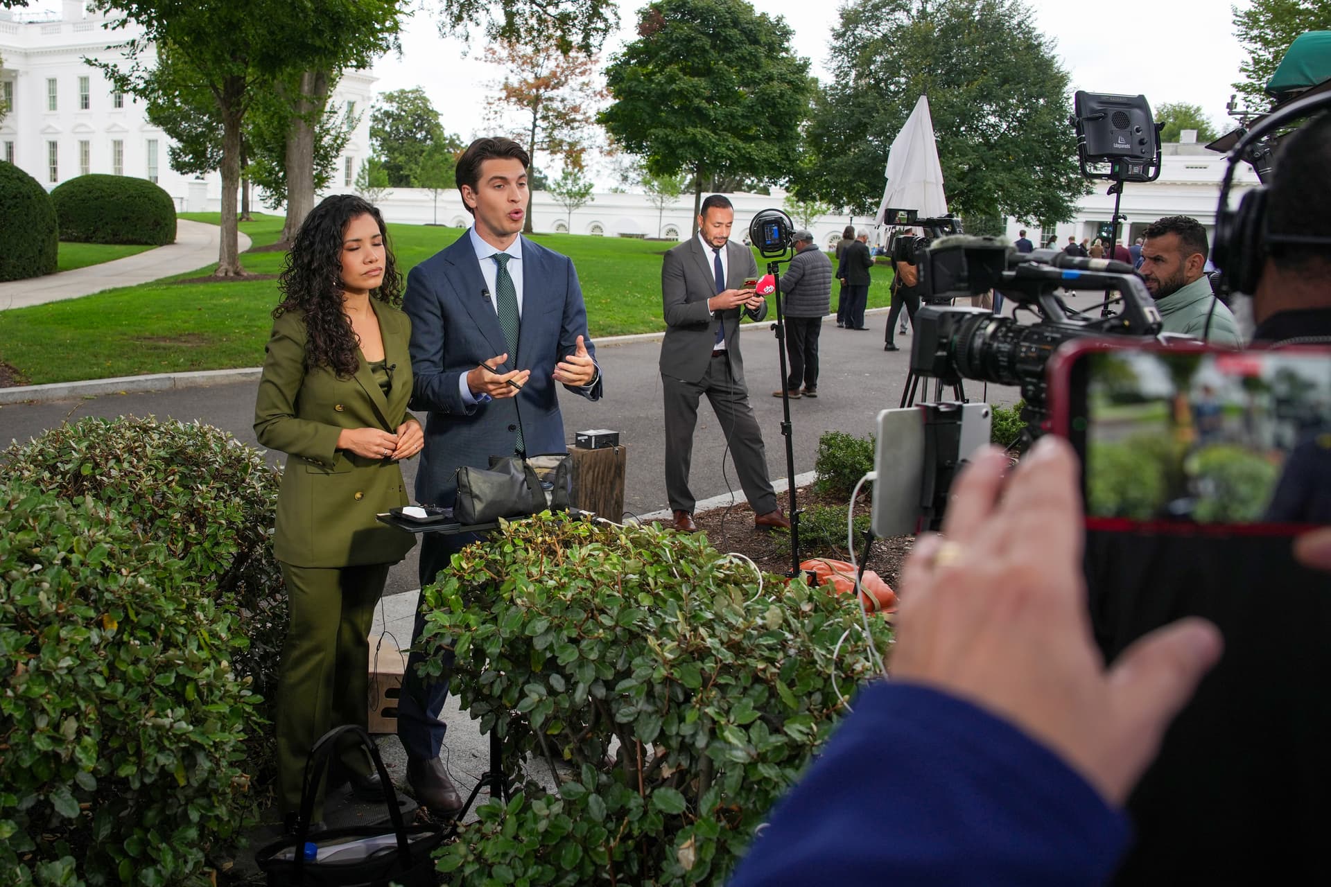 Correspondents for PBS NewsHour and MS NOW report from the White House North Lawn during a respite from President Trump's press ban on September 24, 2026.
