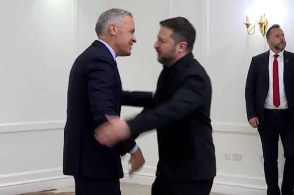 Prime Minister Mark Carney of Canada and President Volodymyr Zelensky of Ukraine embrace at the beginning of a meeting at Calgary, Alberta, on September 10, 2026.