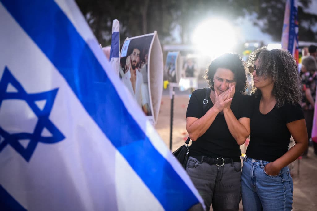 Family members and friends of the lost and kidnapped gather at the site of the Nova Festival to mark the one year anniversary of the attacks by Hamas, on October 07, 2024 at Re'im, Israel.
